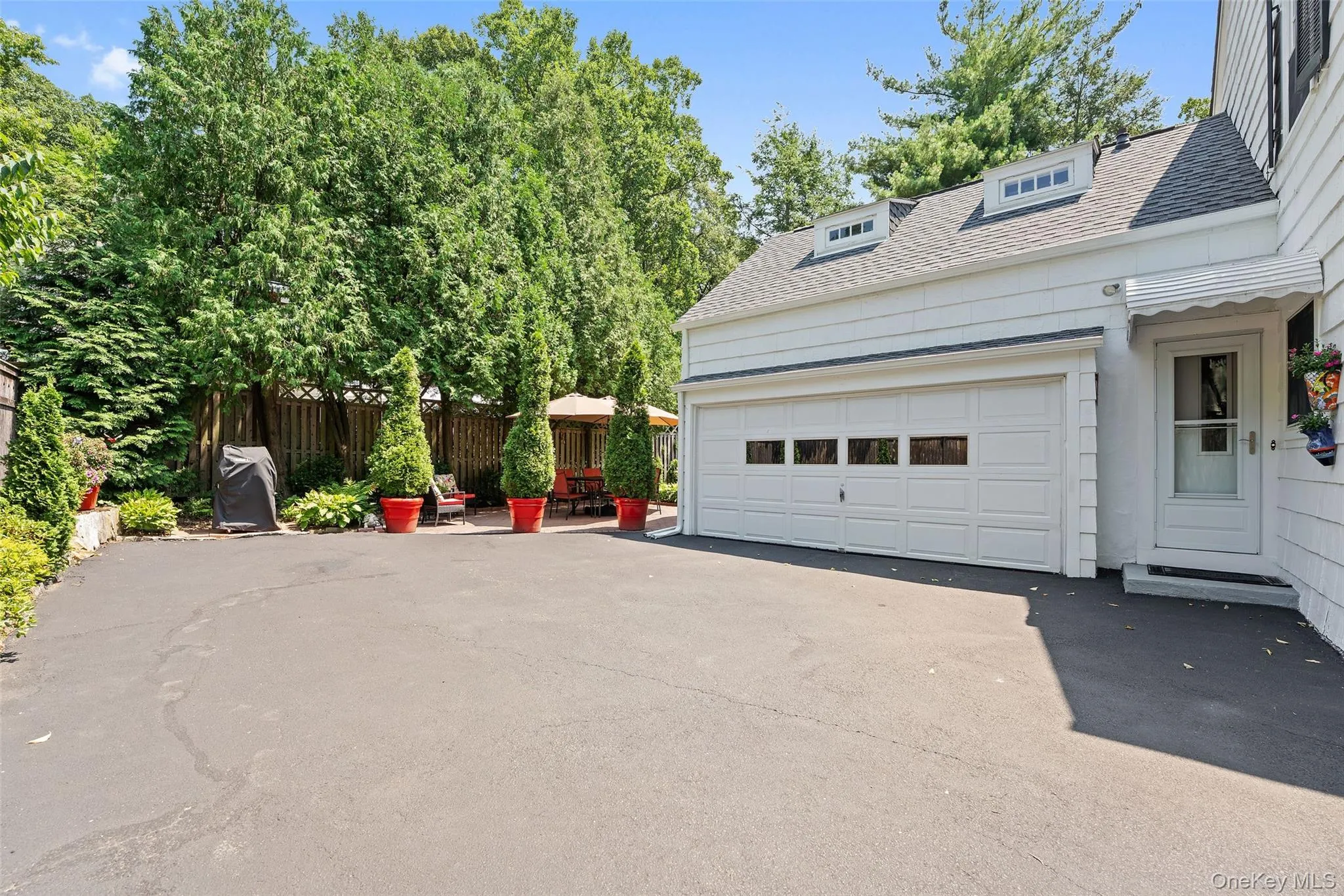Generous Driveway and Two-Car Garage. Generous Driveway and Two-Car Garage.