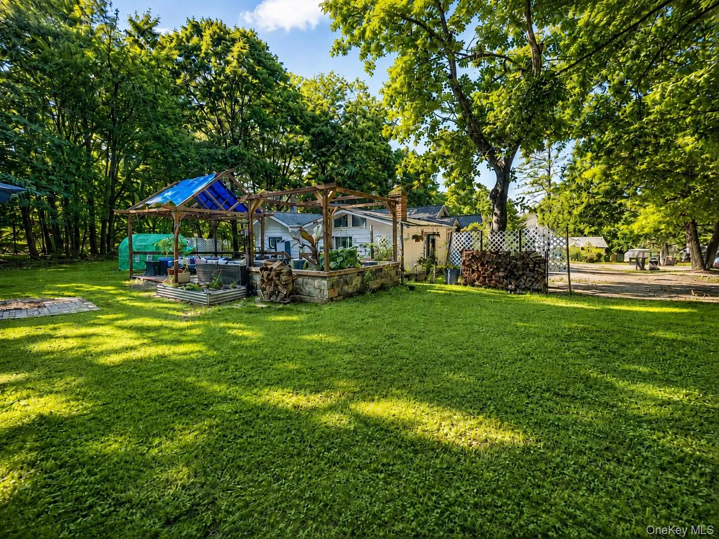 Mature tree-lined grounds with expansive manicured lawn and dappled natural shade Mature tree-lined grounds with expansive manicured lawn and dappled natural shade