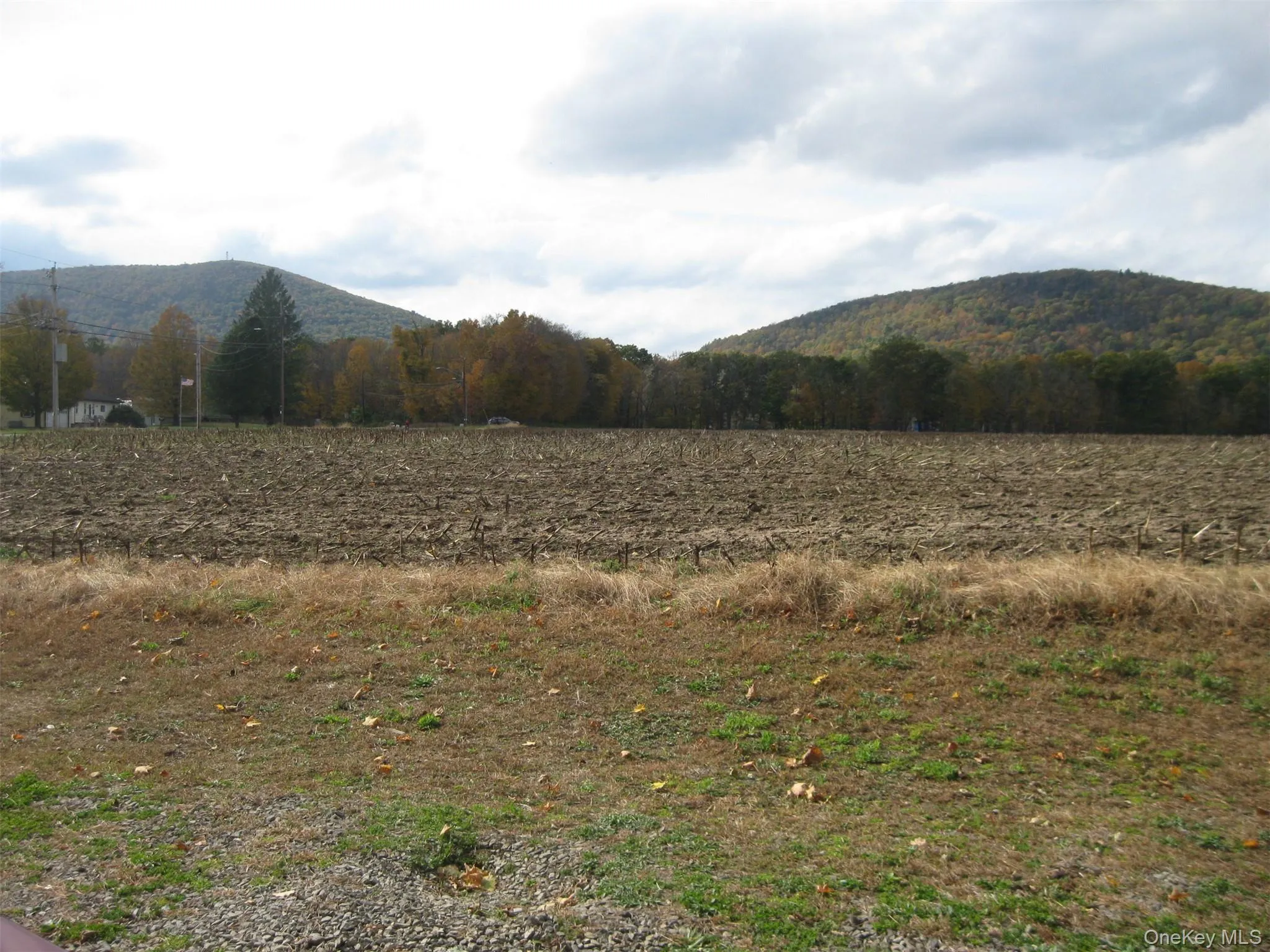 View of mountain background featuring rural landscape View of mountain background featuring rural landscape