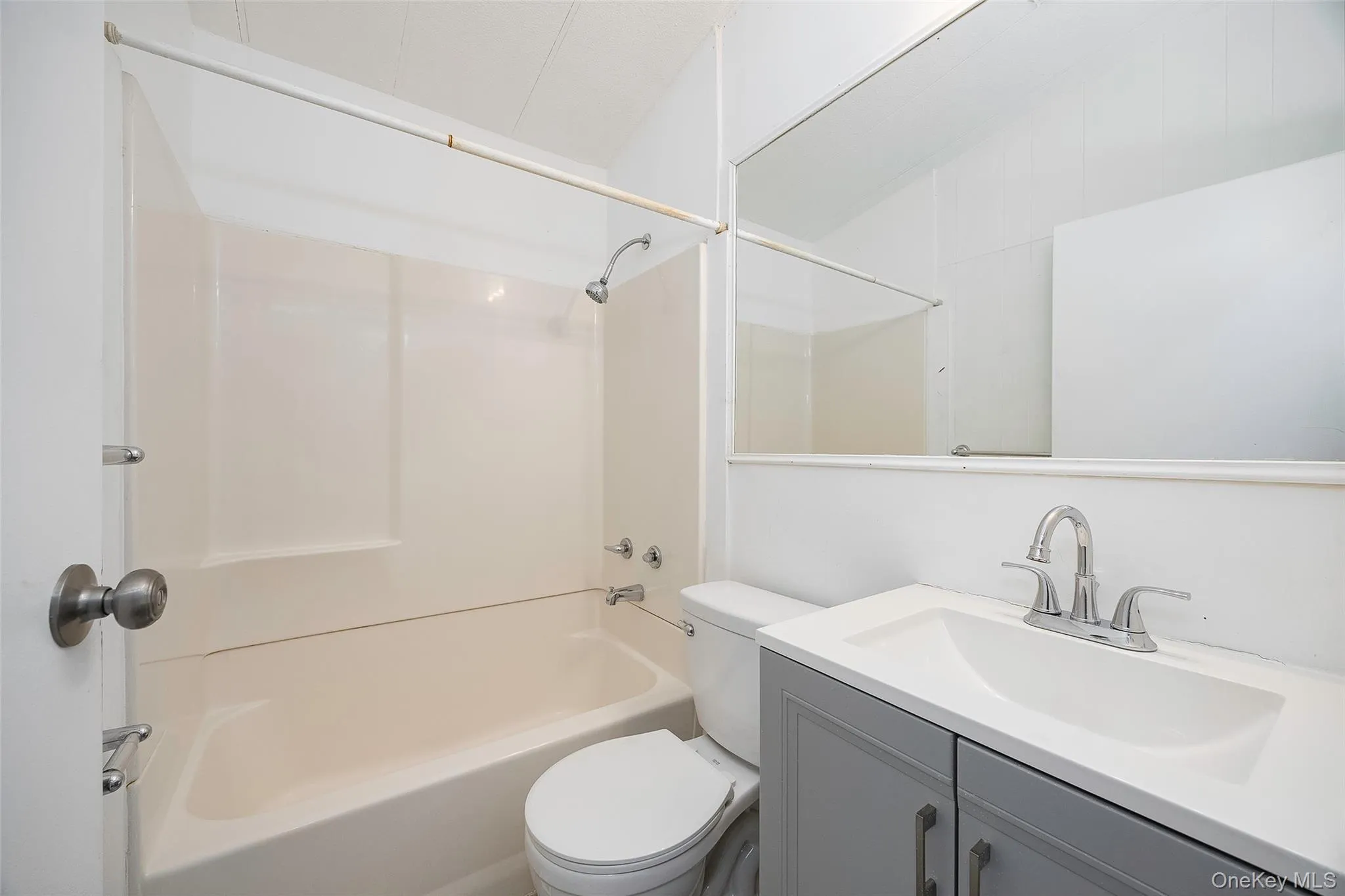 Full bath with shower / bath combination and vanity Full bath with shower / bath combination and vanity