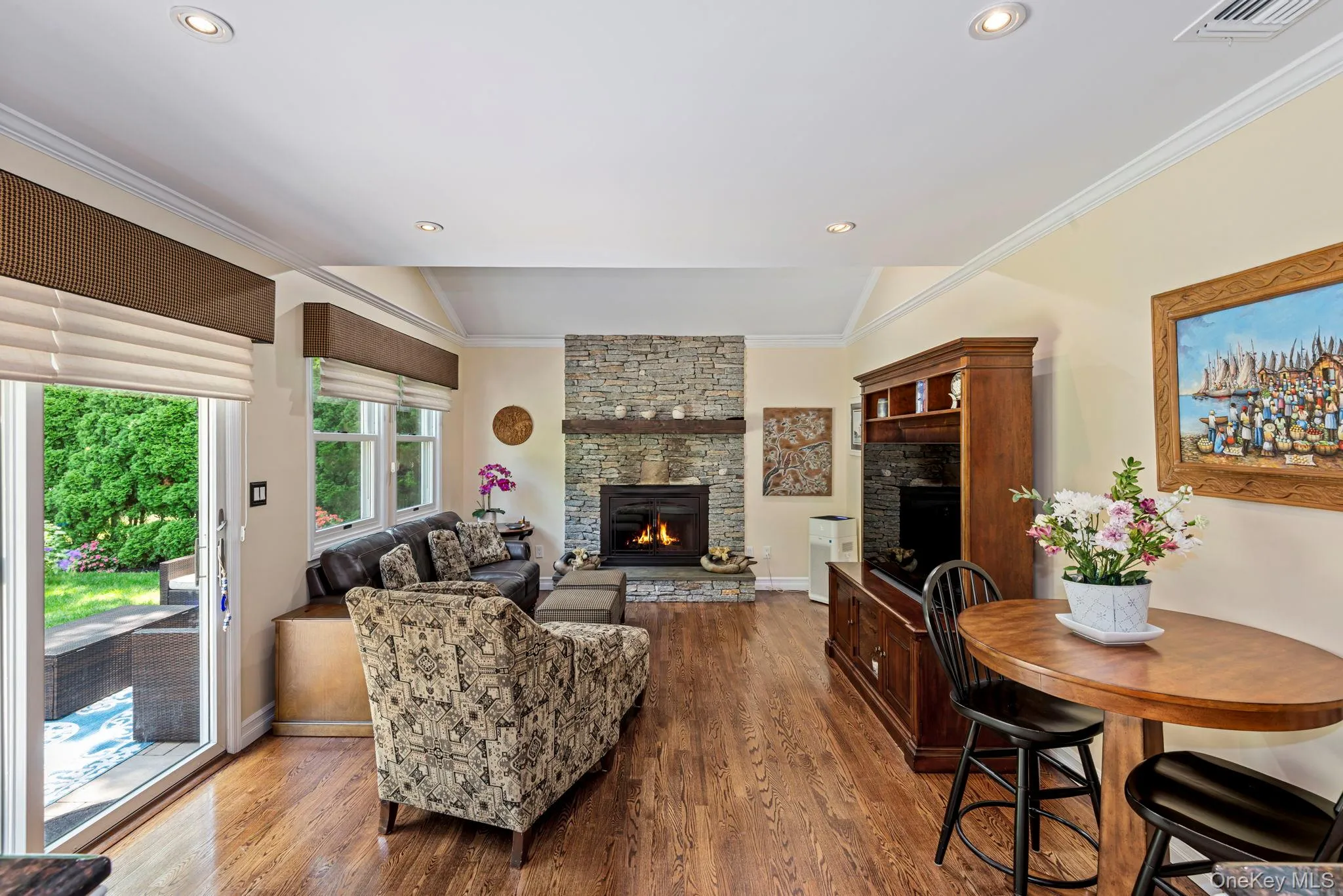 Family Room w/ Gas Fireplace, Sliders to Patio & Garden & Radiant Heated Floors Family Room w/ Gas Fireplace, Sliders to Patio & Garden & Radiant Heated Floors