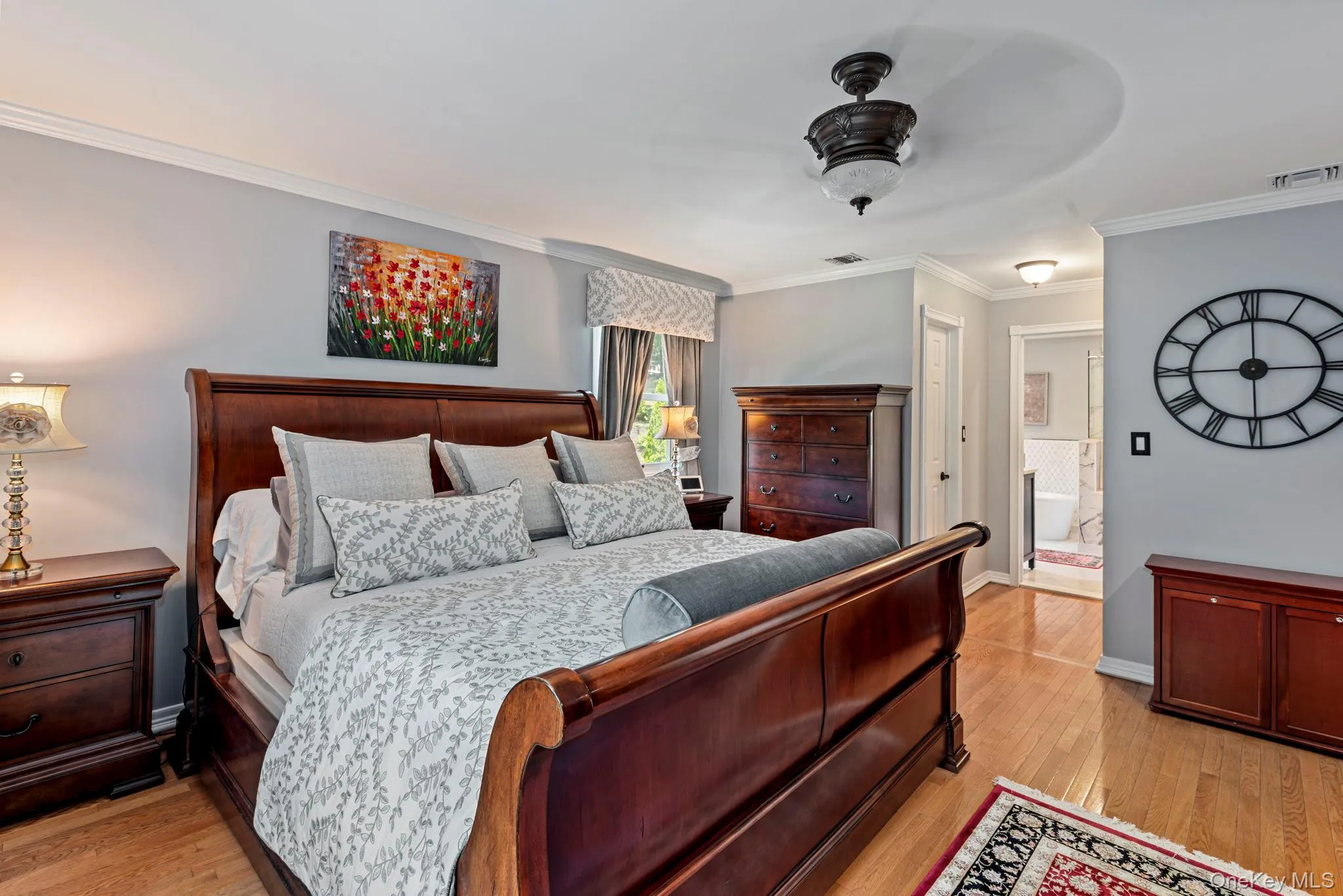 Primary Suite w/ Closet Hall & View of En Suite Primary Suite w/ Closet Hall & View of En Suite