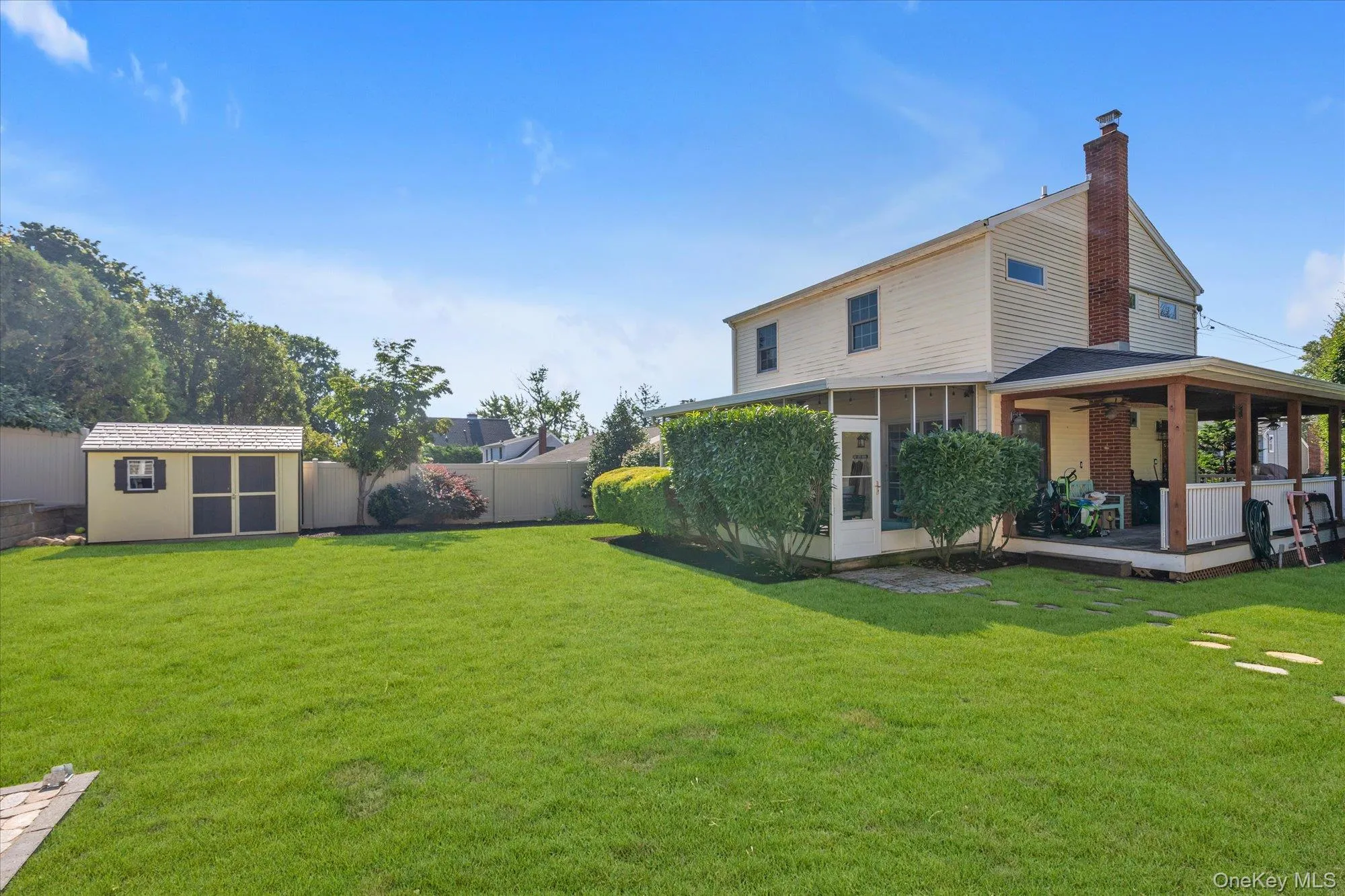 Large completely fenced backyard with two sheds, new masonry work, new vinyl fence and mature landscaping. Large completely fenced backyard with two sheds, new masonry work, new vinyl fence and mature landscaping.