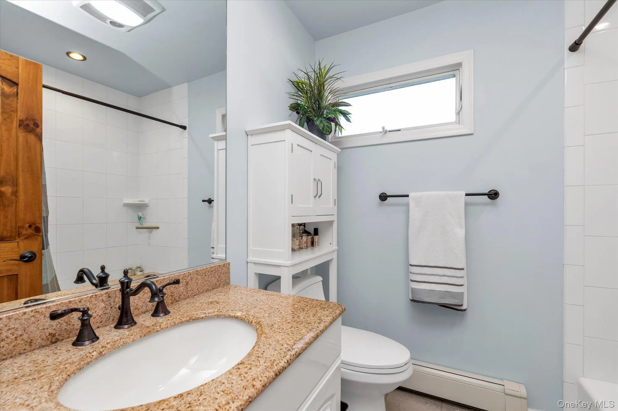 Second floor full bathroom with granite countertops. Second floor full bathroom with granite countertops.