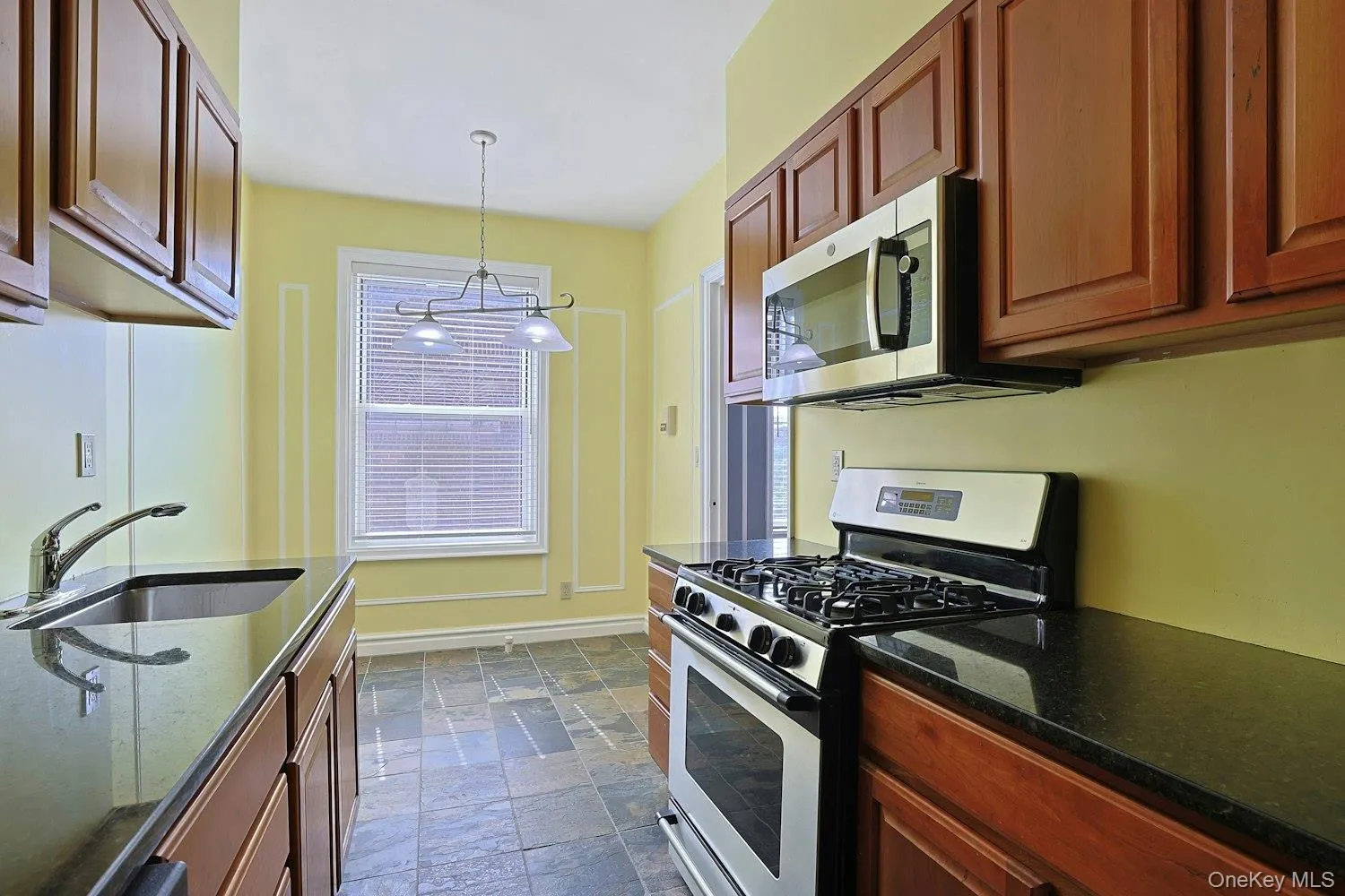 Well-Appointed Kitchen Featuring Stainless Steel Appliances Well-Appointed Kitchen Featuring Stainless Steel Appliances