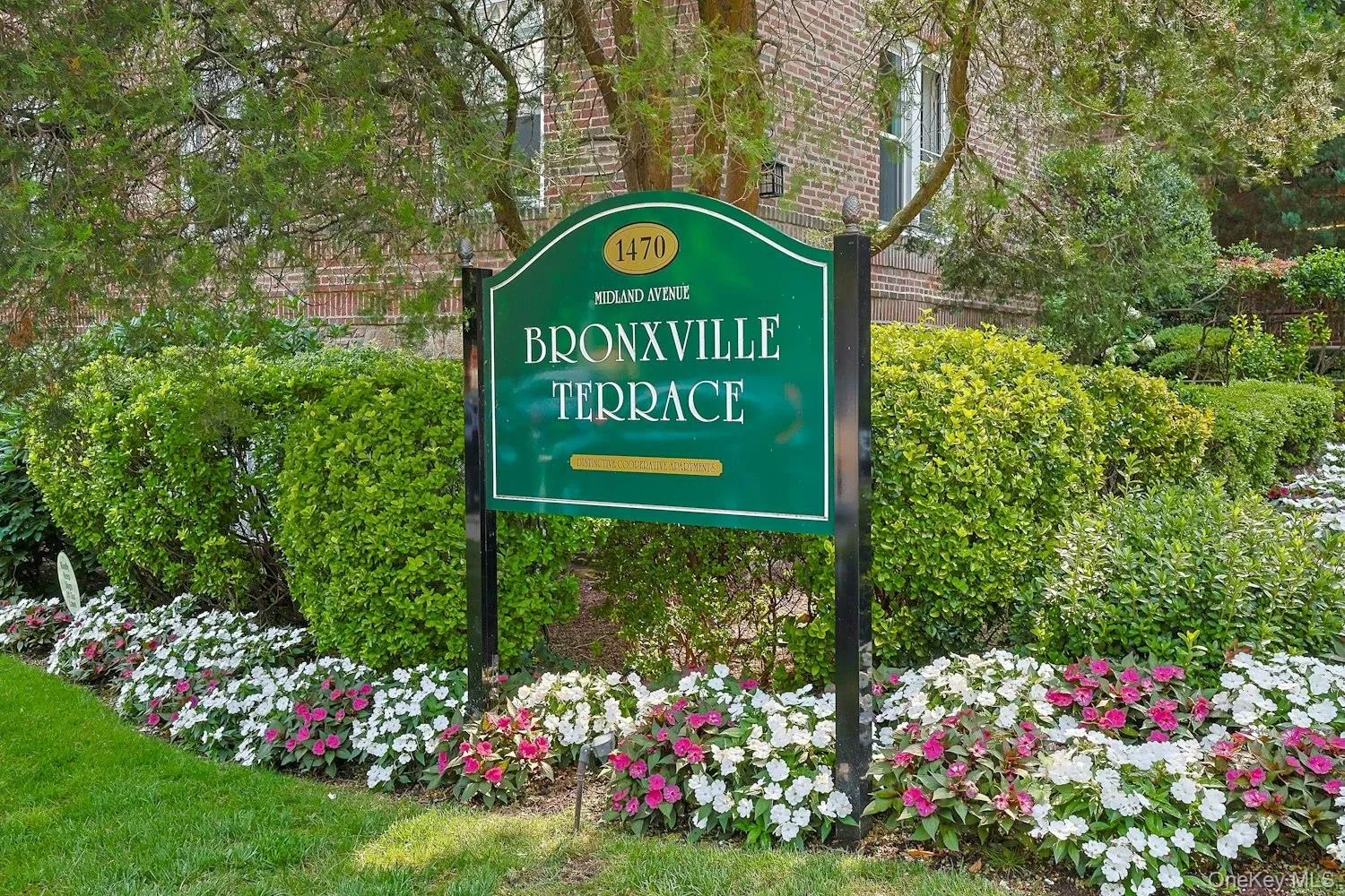 Beautifully Maintained Grounds with Lush Landscaping and Colorful Flowers Beautifully Maintained Grounds with Lush Landscaping and Colorful Flowers