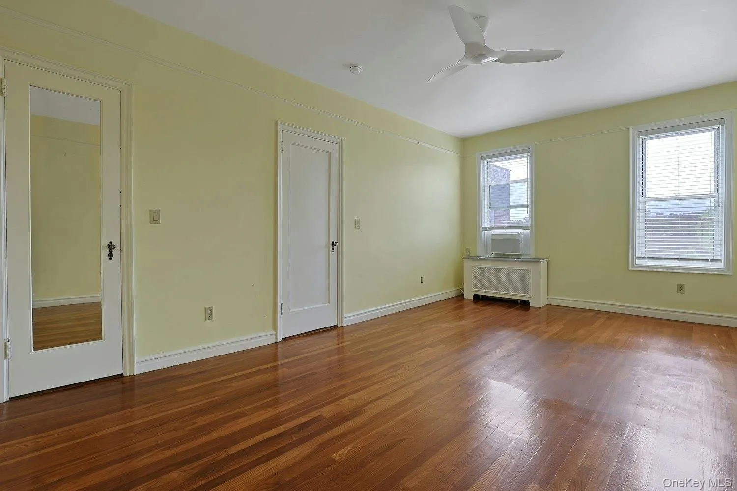 Generously Proportioned Primary Bedroom with Multiple Windows Generously Proportioned Primary Bedroom with Multiple Windows