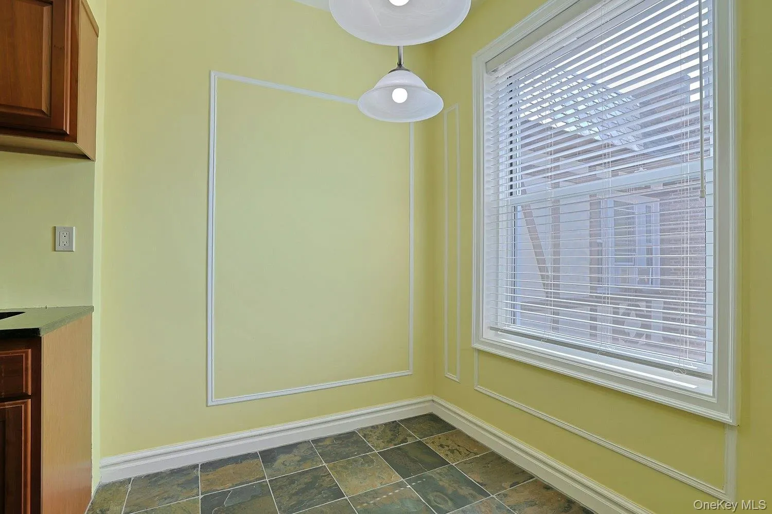 Charming Breakfast Nook Positioned Beside a Large Window Charming Breakfast Nook Positioned Beside a Large Window