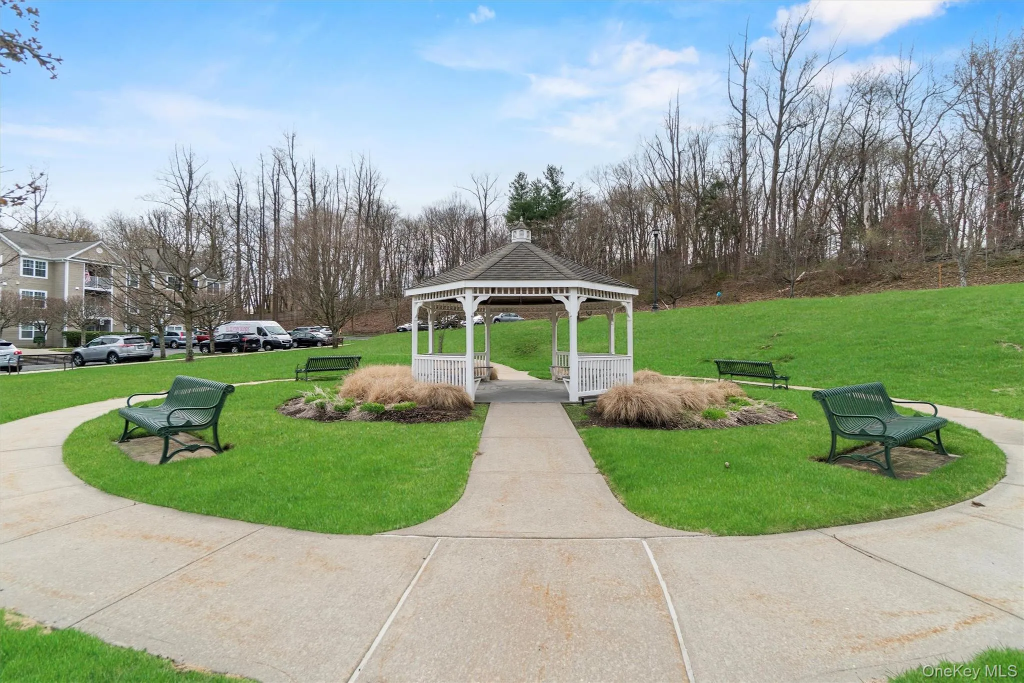 View of property's community featuring a yard and a gazebo View of property's community featuring a yard and a gazebo