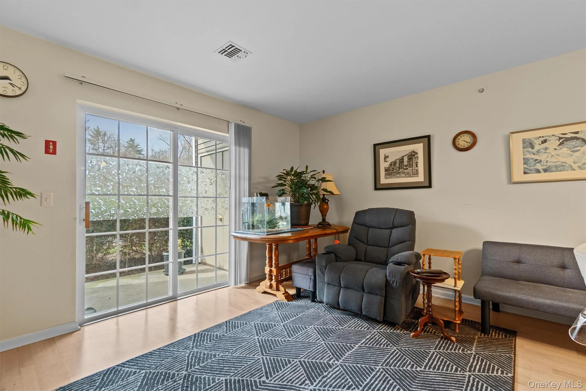 Sitting room with wood finished floors. Sitting room with wood finished floors.
