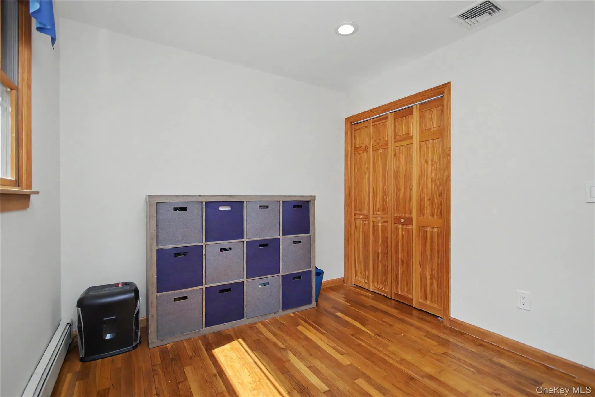 Third Bedroom with Hardwood Floors Third Bedroom with Hardwood Floors