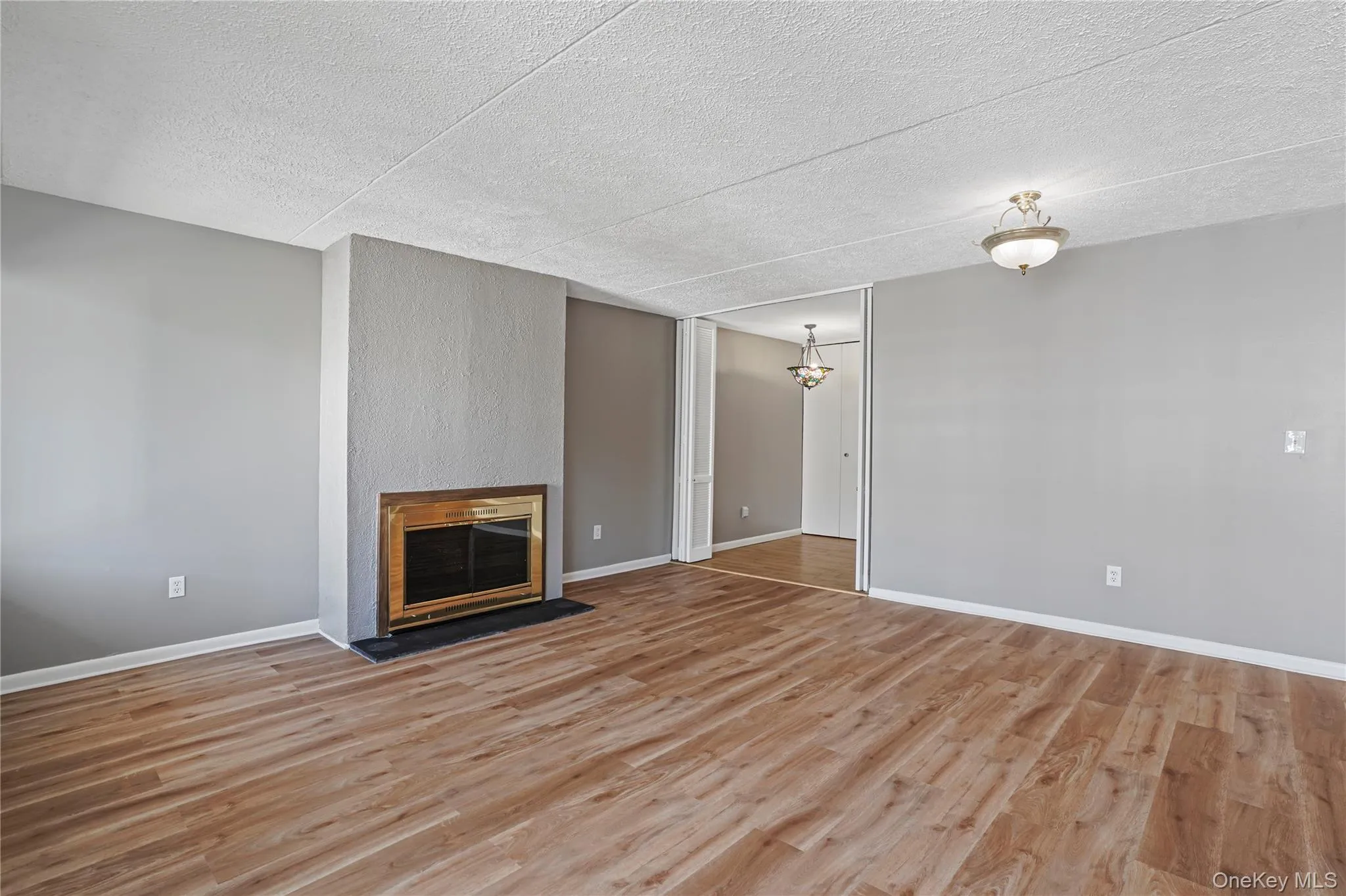 Perfect spot for a dining room table. The fireplace is only decorative. Perfect spot for a dining room table. The fireplace is only decorative.