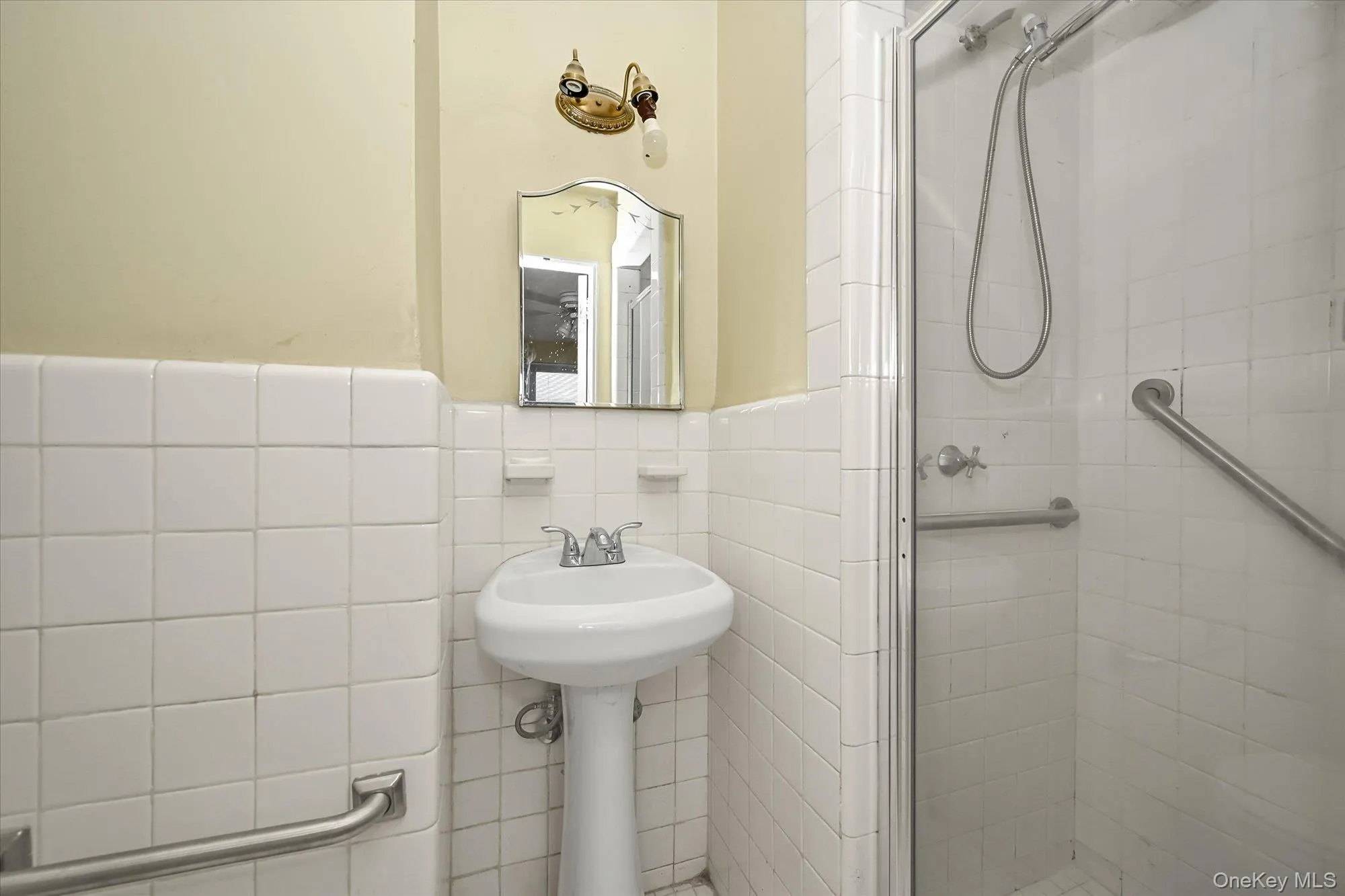 Pedestal sink with dual-handle faucet Pedestal sink with dual-handle faucet