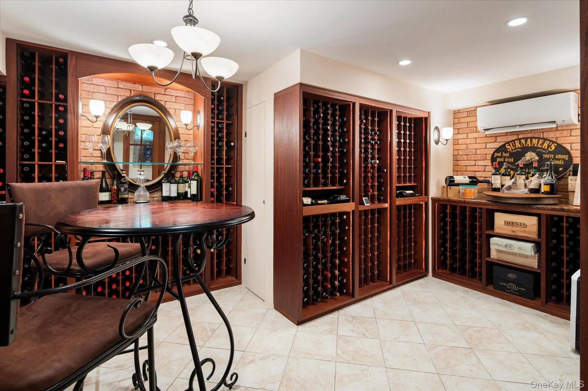 Finished lower level wine storage room. Finished lower level wine storage room.
