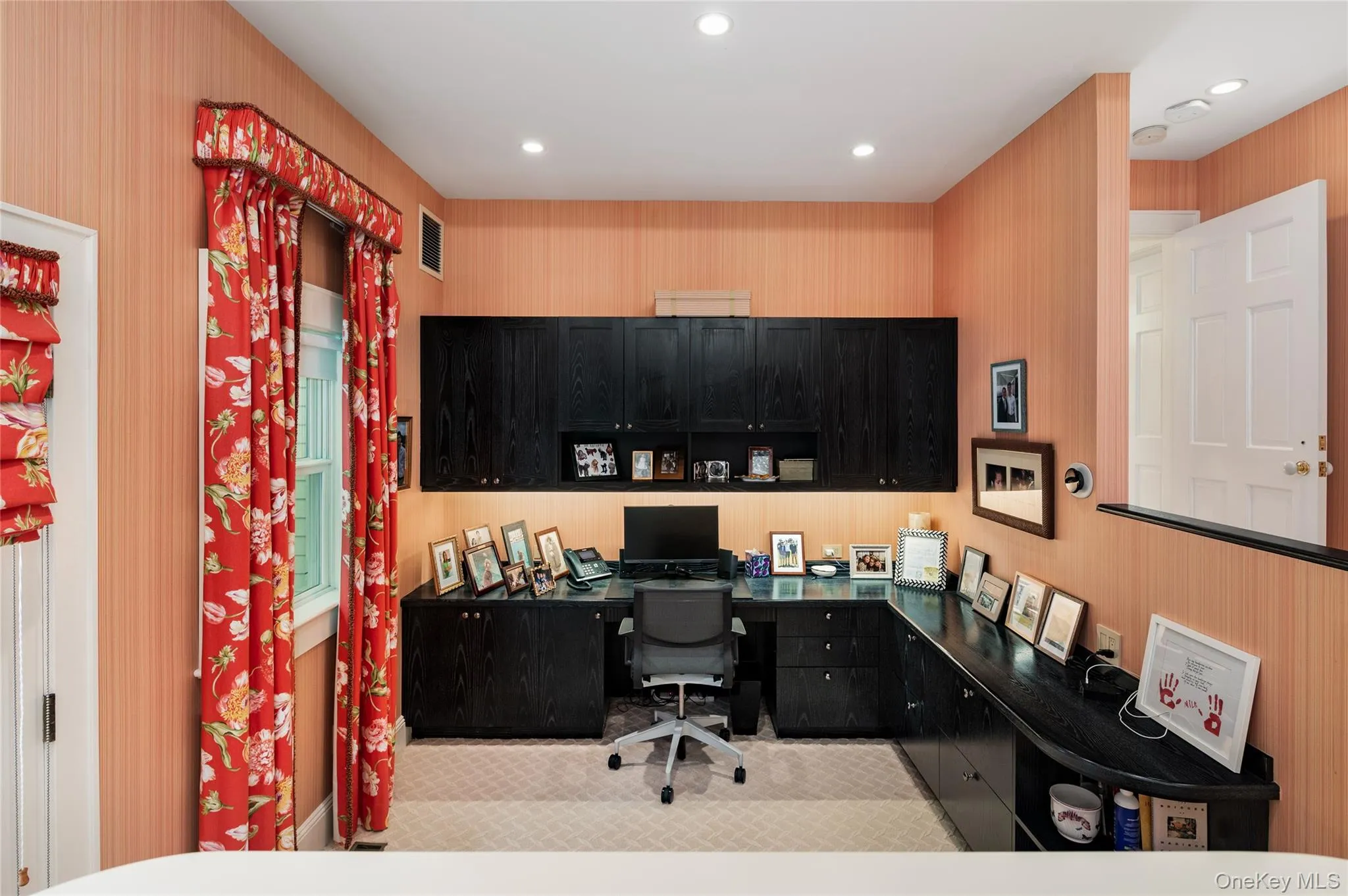 Two steps down from primary bedroom showing custom office and acces out to the private side patio. Two steps down from primary bedroom showing custom office and acces out to the private side patio.