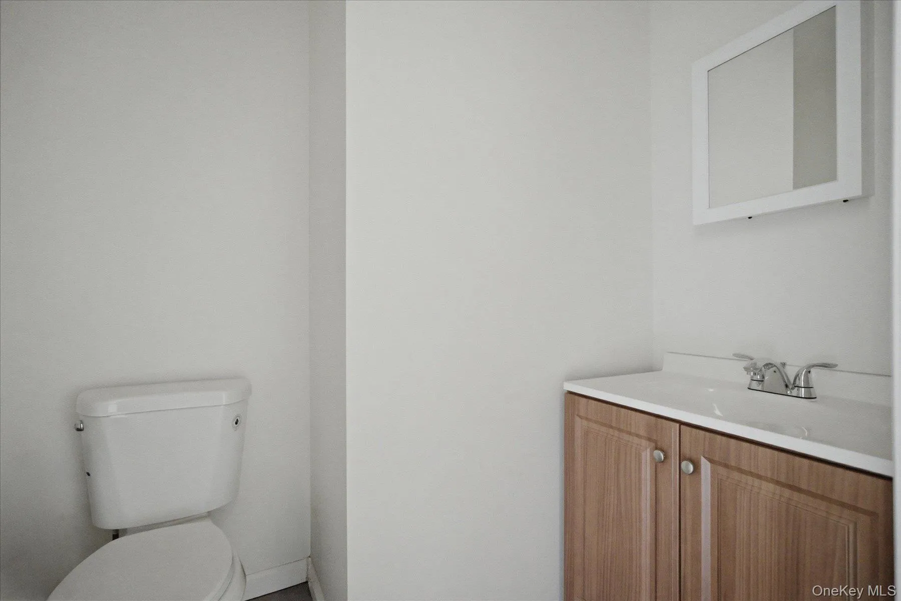 1/2 Bath in Hallway 1/2 Bath in Hallway