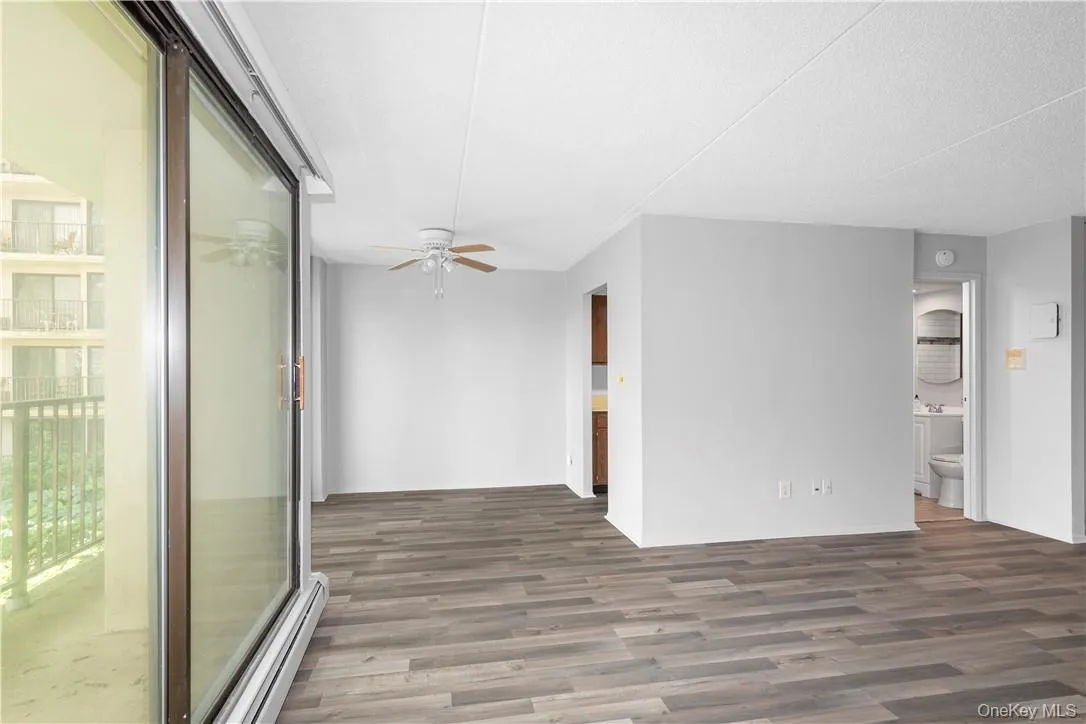 Open concept with sliders to balcony Open concept with sliders to balcony