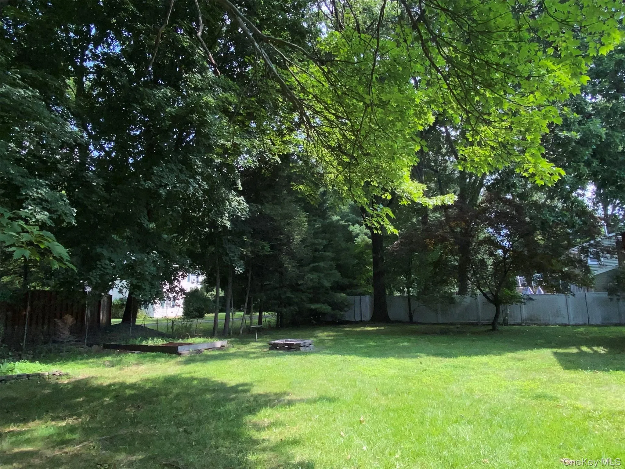 Spacious wide open private flat backyard with wooden swing and room for a pool or possibly even a pickleball court Spacious wide open private flat backyard with wooden swing and room for a pool or possibly even a pickleball court
