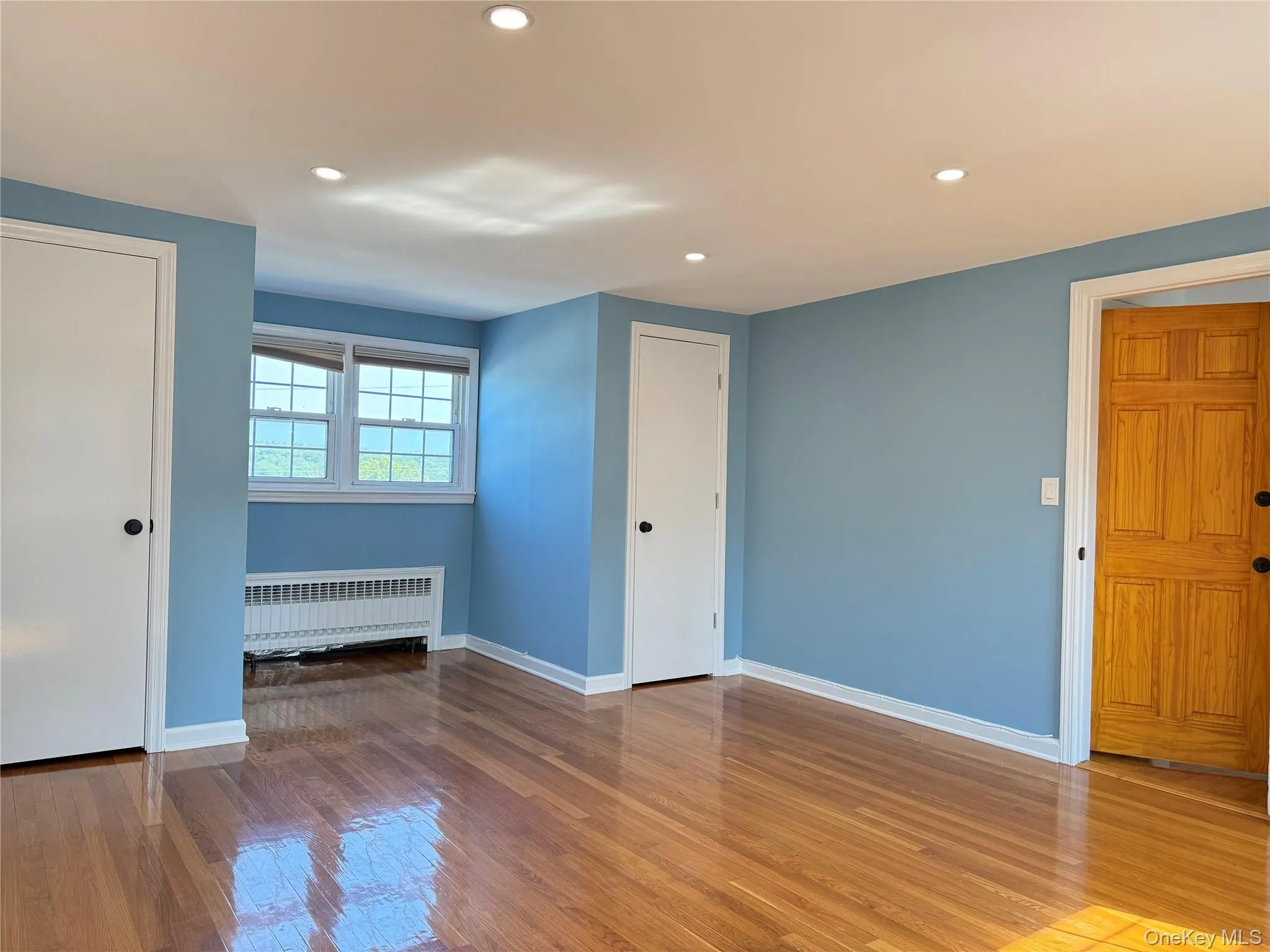 Alternate view of the second bedroom highlighting ample closet space. Alternate view of the second bedroom highlighting ample closet space.