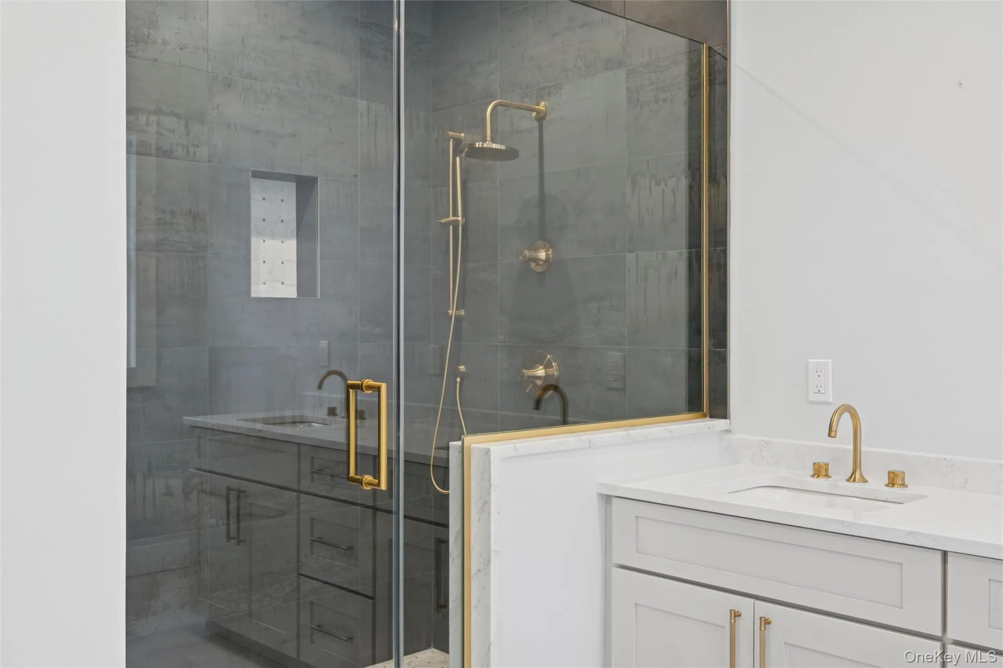 Primary bathroom with vanity and a stall shower Primary bathroom with vanity and a stall shower