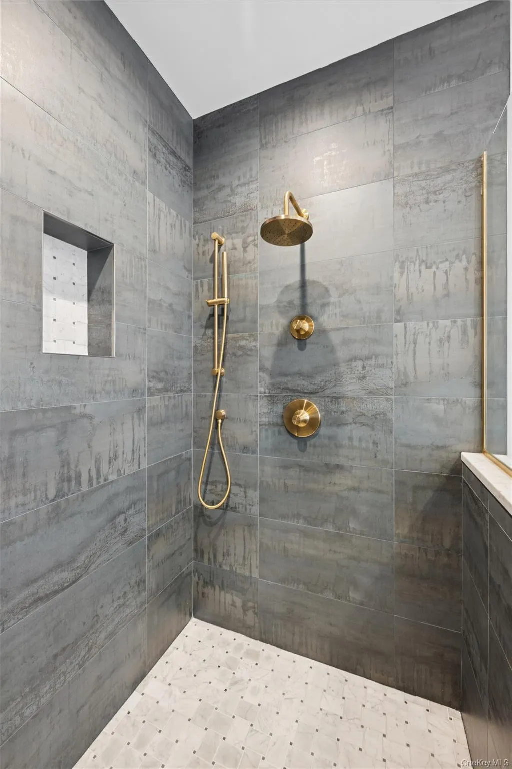Primary bathroom featuring walk in shower Primary bathroom featuring walk in shower