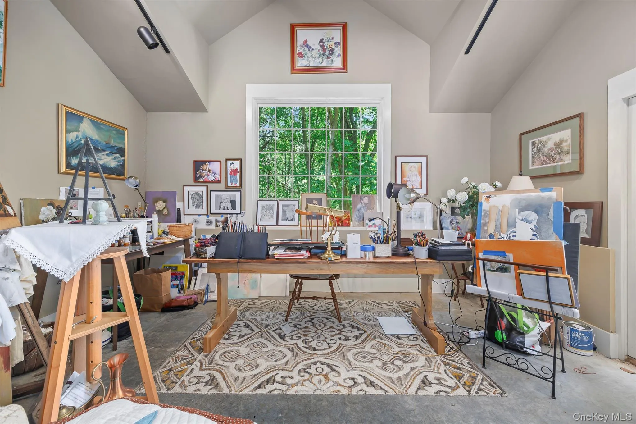 A wonderful art studio with very high ceiling has a private patio and glass sliding doors, offering great light A wonderful art studio with very high ceiling has a private patio and glass sliding doors, offering great light