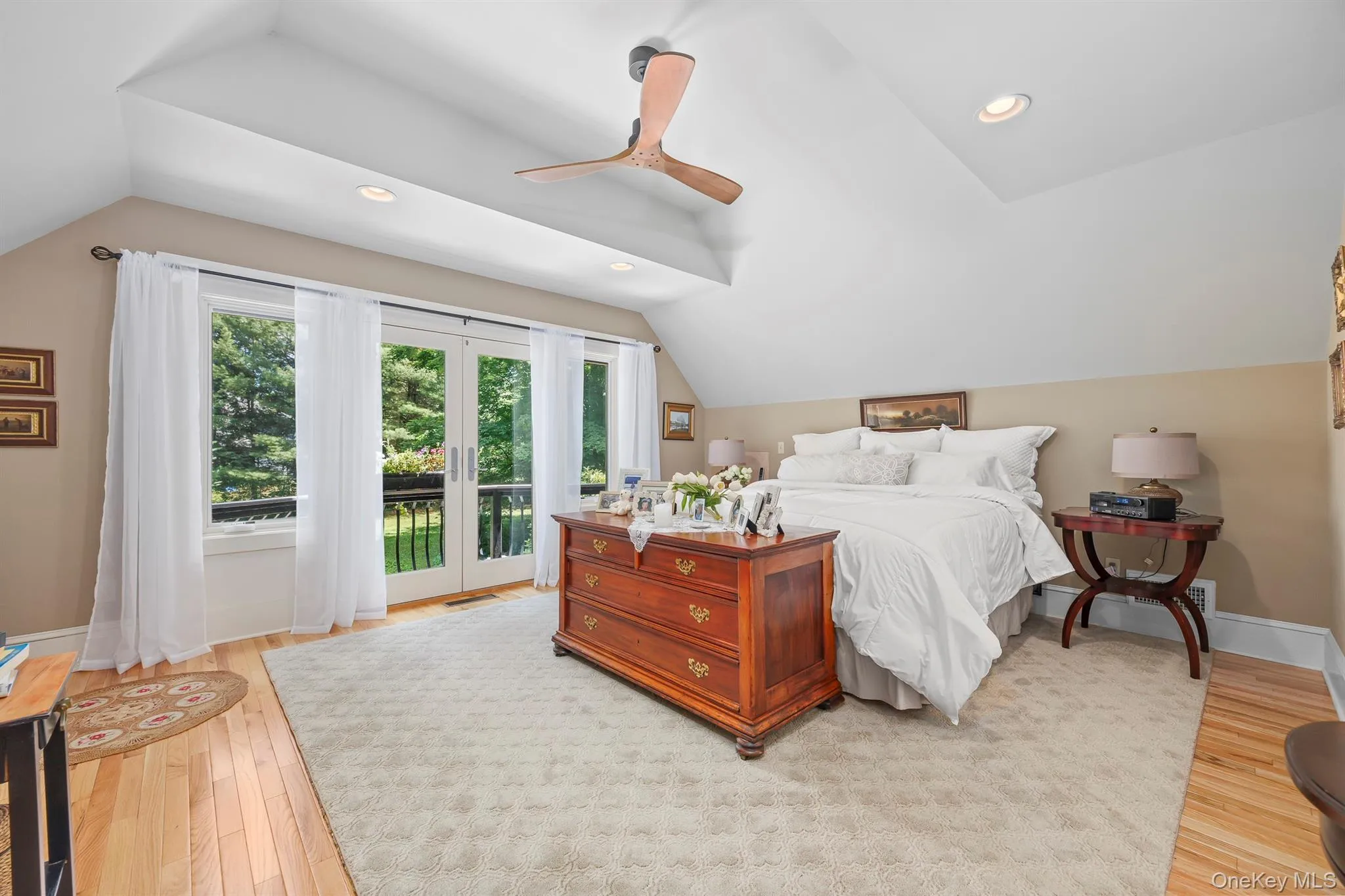 A very large, fabulous light-filled primary bedroom with a juliet balcony overlooks the back yard A very large, fabulous light-filled primary bedroom with a juliet balcony overlooks the back yard