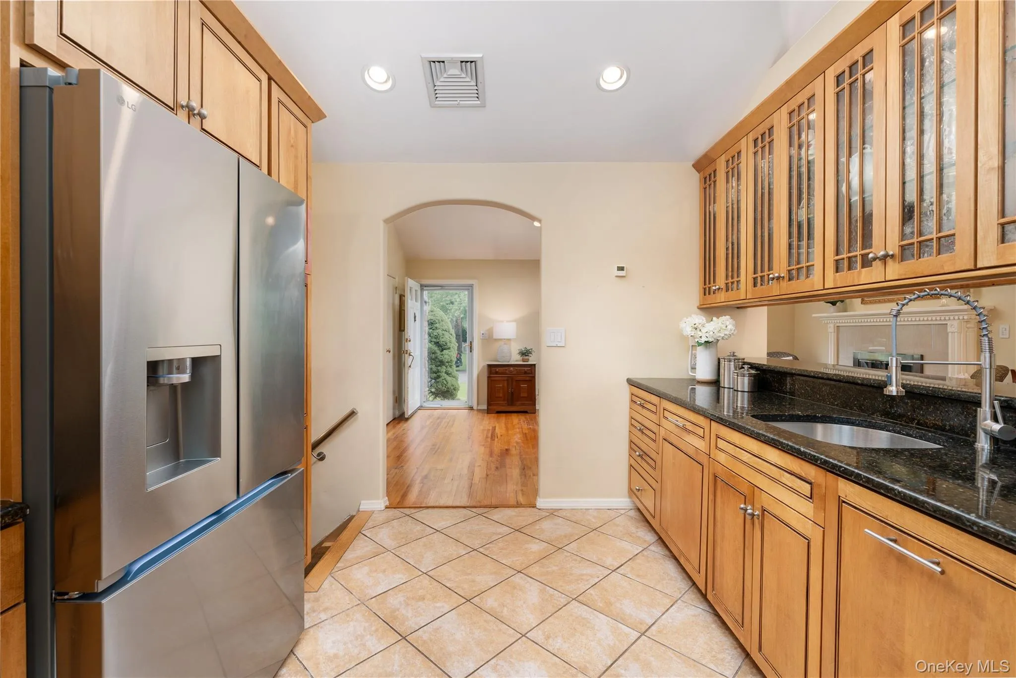 Custom wood cabinetry with accent lighting Custom wood cabinetry with accent lighting