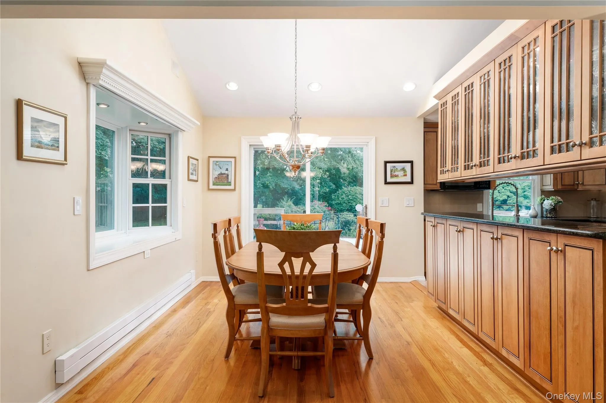 HW floors, Vaulted ceiling, overhead light, bay window, sliders to backyard deck HW floors, Vaulted ceiling, overhead light, bay window, sliders to backyard deck