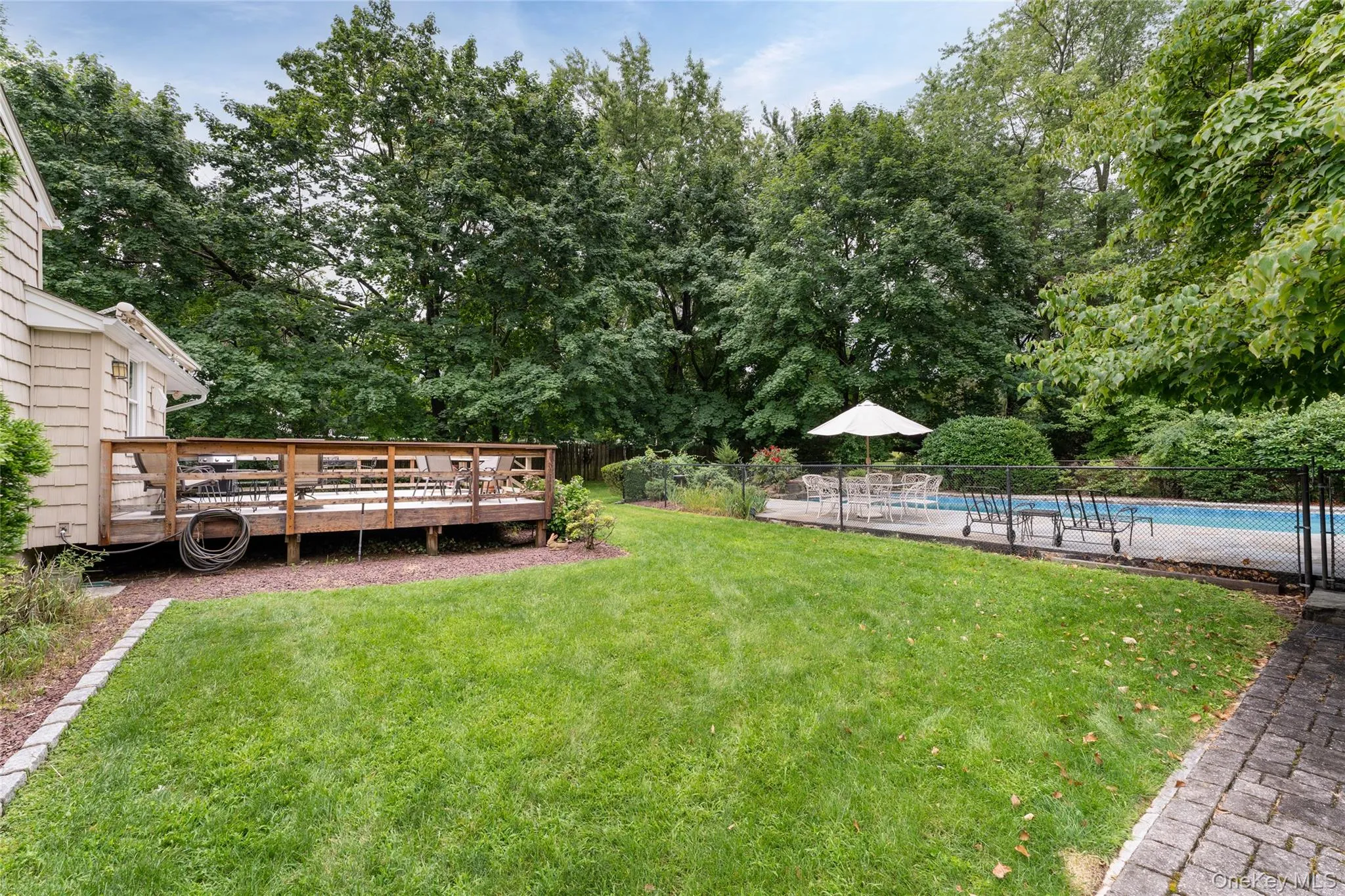 Enjoy 0.43 acre flat private yard, gardens, deck, pool, in-ground sprinklers 8-zone Enjoy 0.43 acre flat private yard, gardens, deck, pool, in-ground sprinklers 8-zone