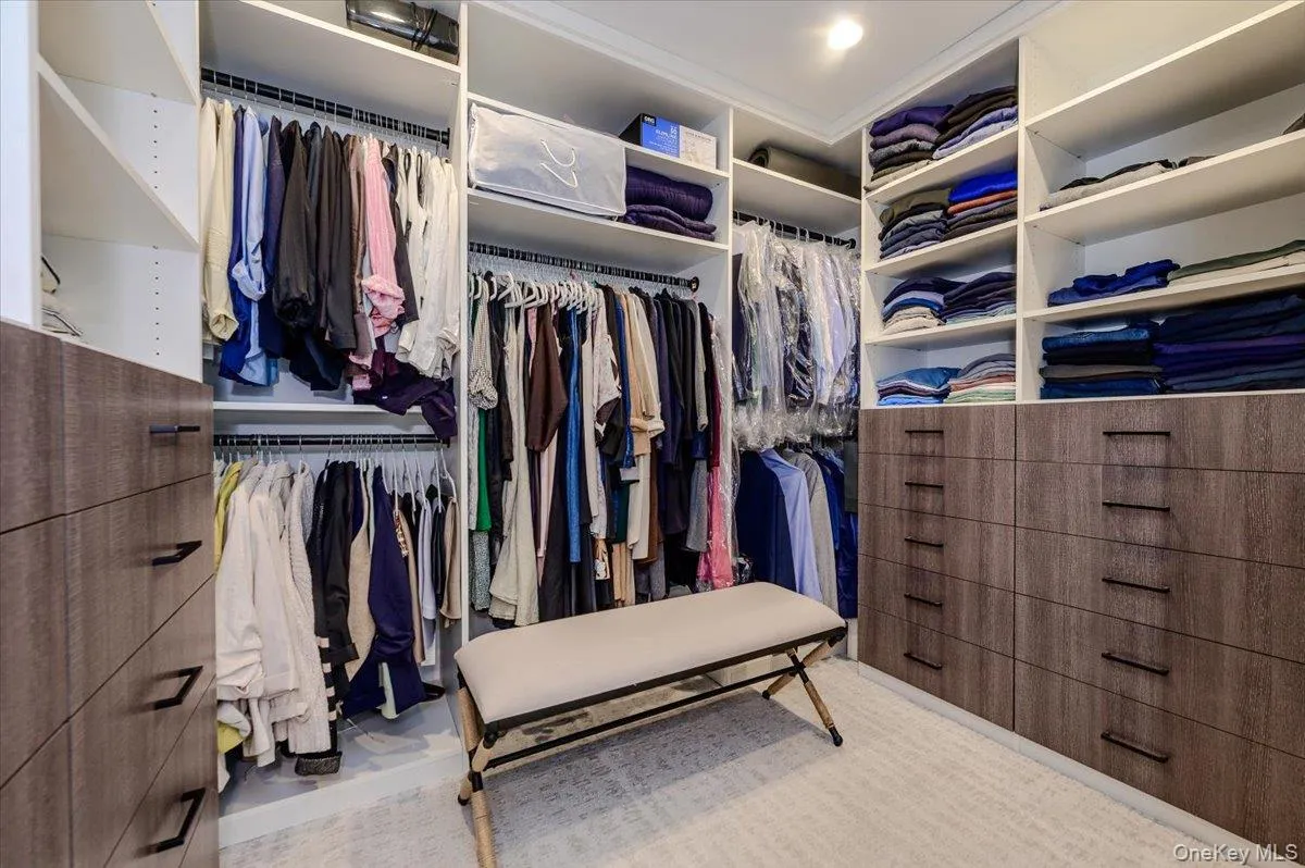 Primary Bedroom Walk-In-Closet Primary Bedroom Walk-In-Closet