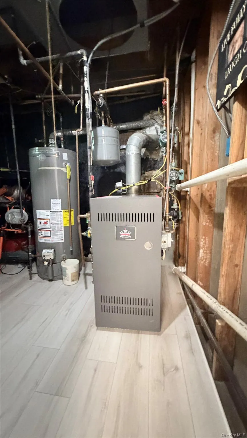 Mechanical room featuring a new gas furnace unit, hot water heater, Mechanical room featuring a new gas furnace unit, hot water heater,
