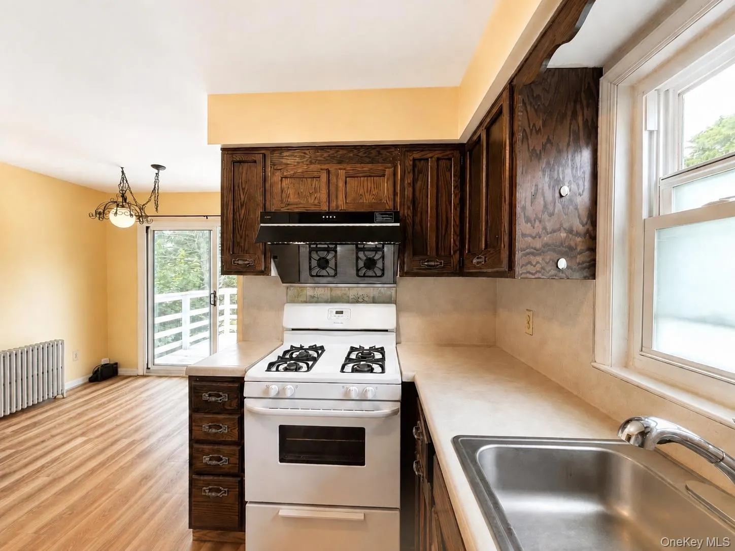 Kitchen with adjacent breakfast area, offering additional casual dining space. Kitchen with adjacent breakfast area, offering additional casual dining space.