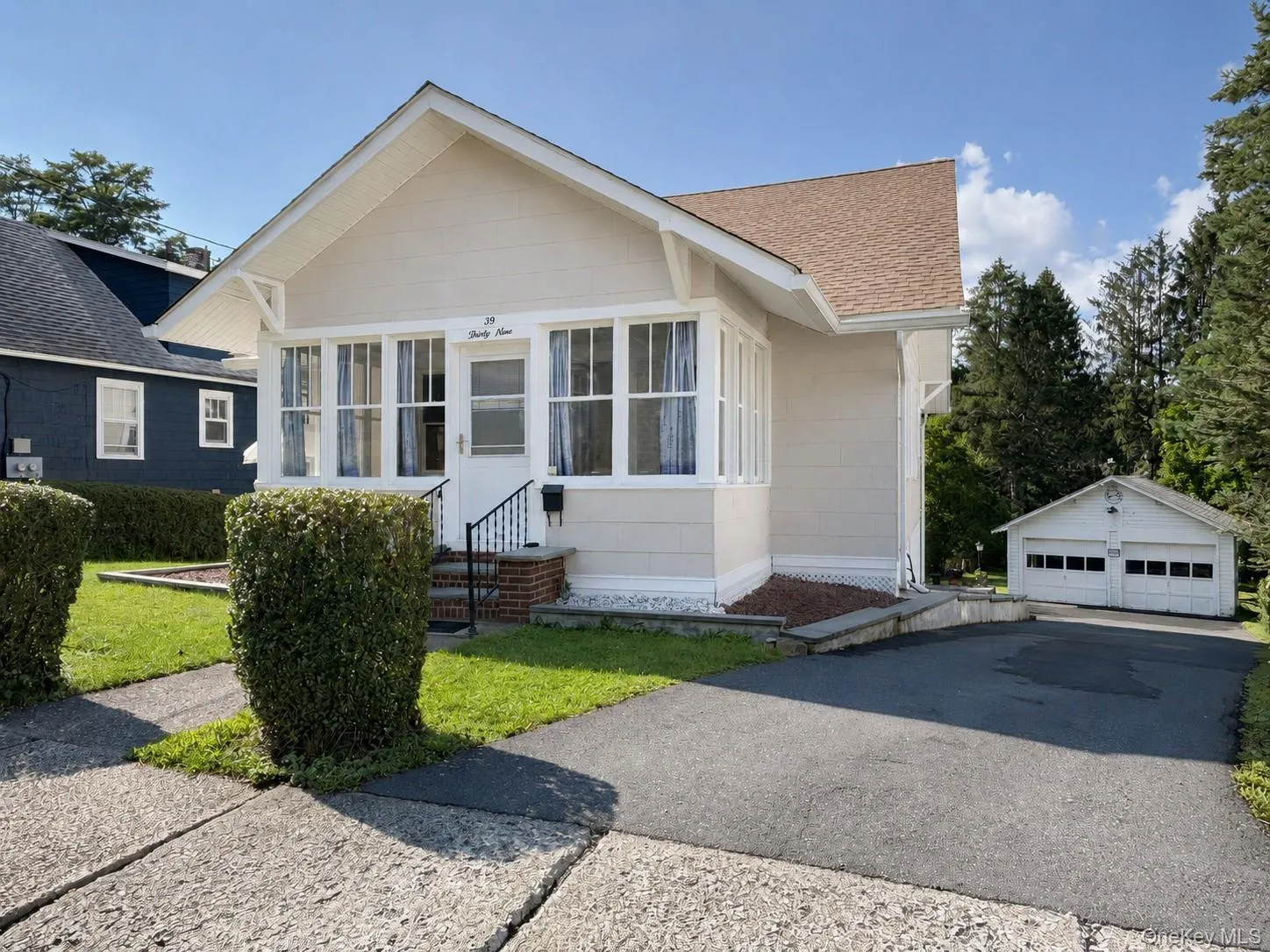 Long driveway with detached garage and ample parking. Long driveway with detached garage and ample parking.