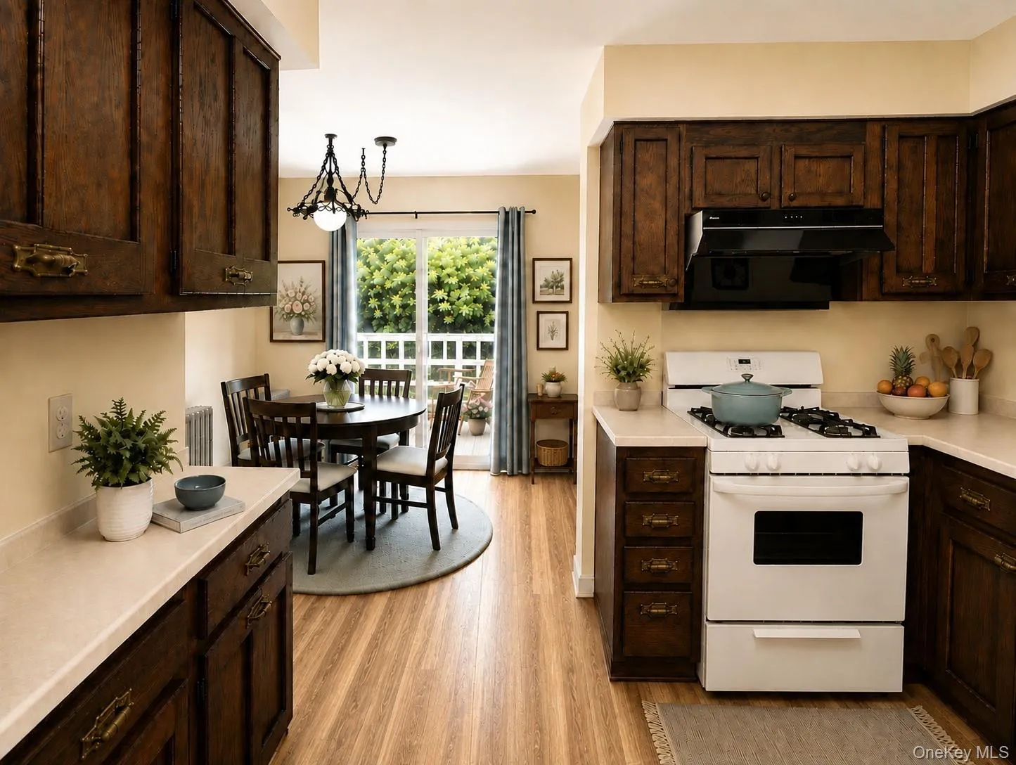 Kitchen with direct access to the rear deck.(Virtual Staged) Kitchen with direct access to the rear deck.(Virtual Staged)