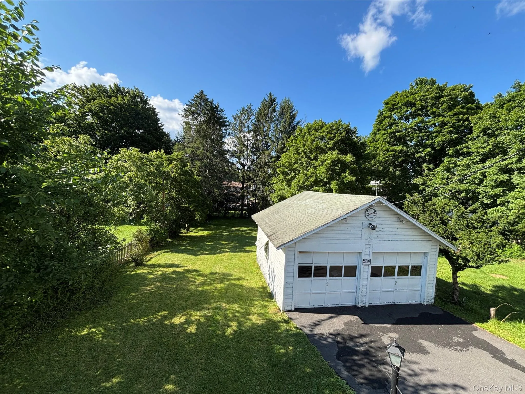 Deep backyard surrounded by mature trees for added privacy. Deep backyard surrounded by mature trees for added privacy.