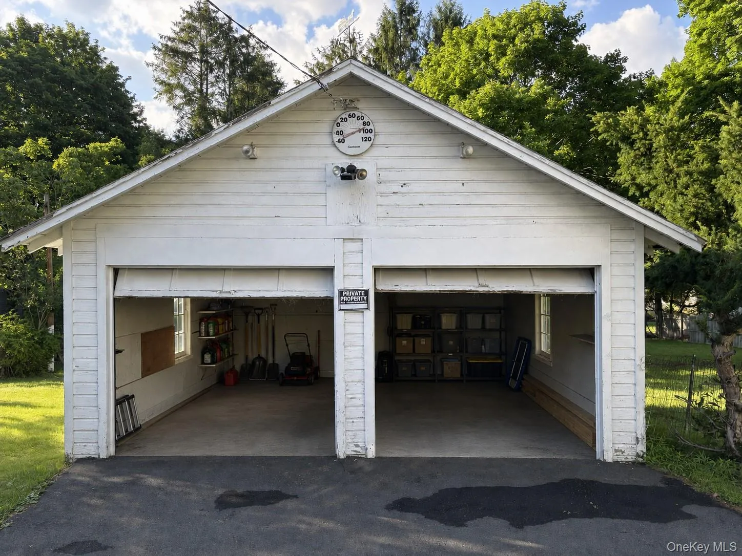 Detached two-car garage offering additional parking and storage. Detached two-car garage offering additional parking and storage.