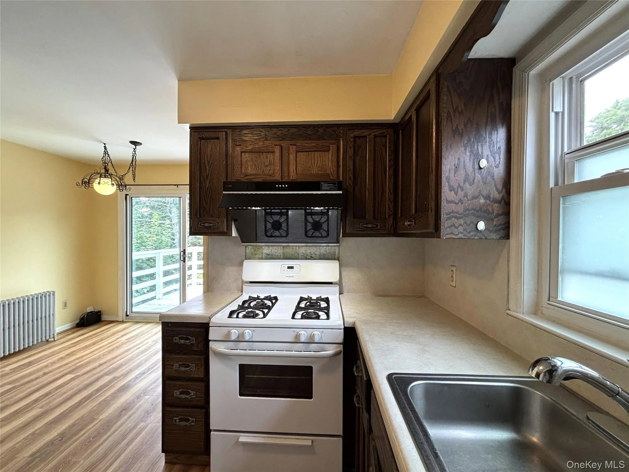 Kitchen with adjacent breakfast area, offering additional casual dining space. Kitchen with adjacent breakfast area, offering additional casual dining space.