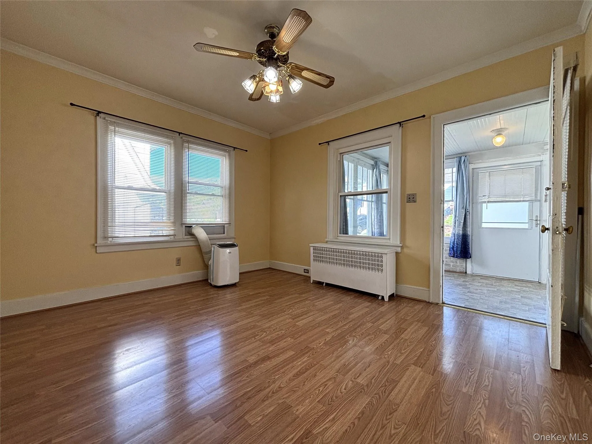 Comfortable living room with abundant natural light. Comfortable living room with abundant natural light.