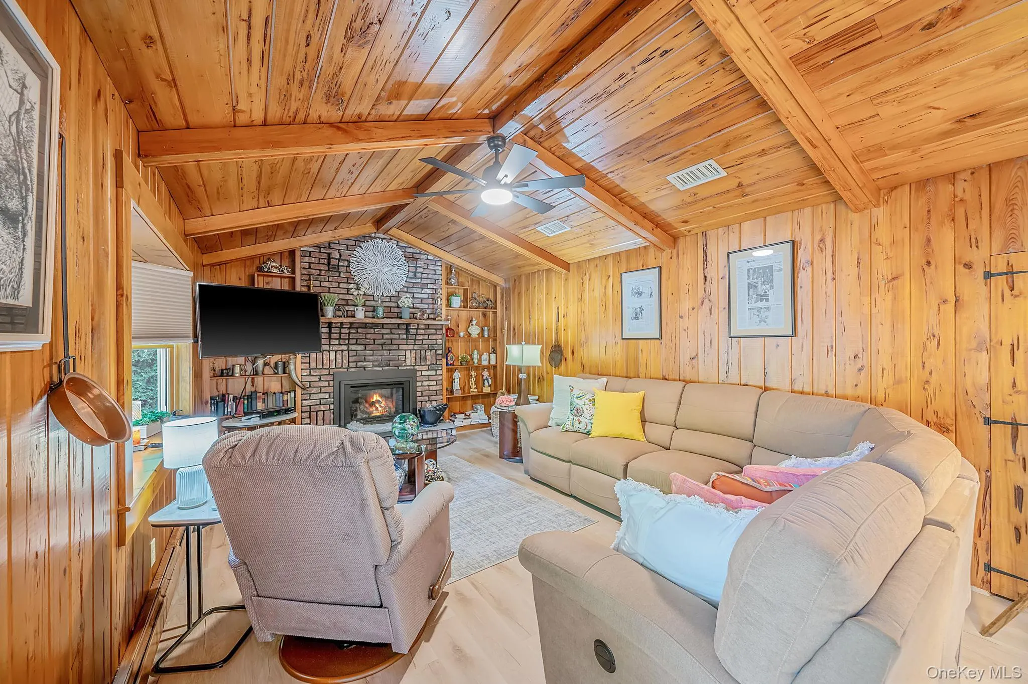 Vaulted wood-paneled ceiling with exposed beams Vaulted wood-paneled ceiling with exposed beams