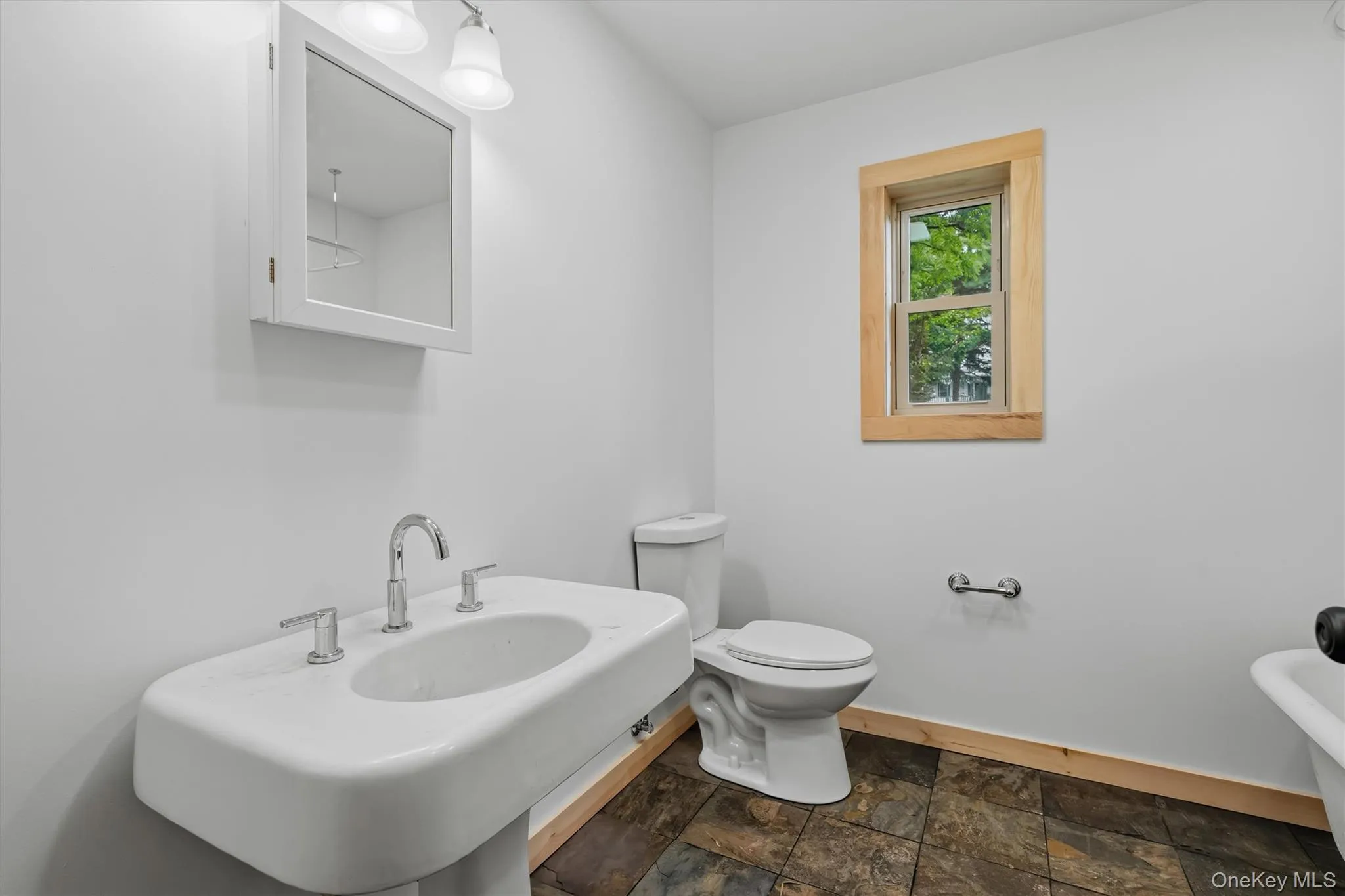 Main floor bathroom with claw foot tub/shower Main floor bathroom with claw foot tub/shower