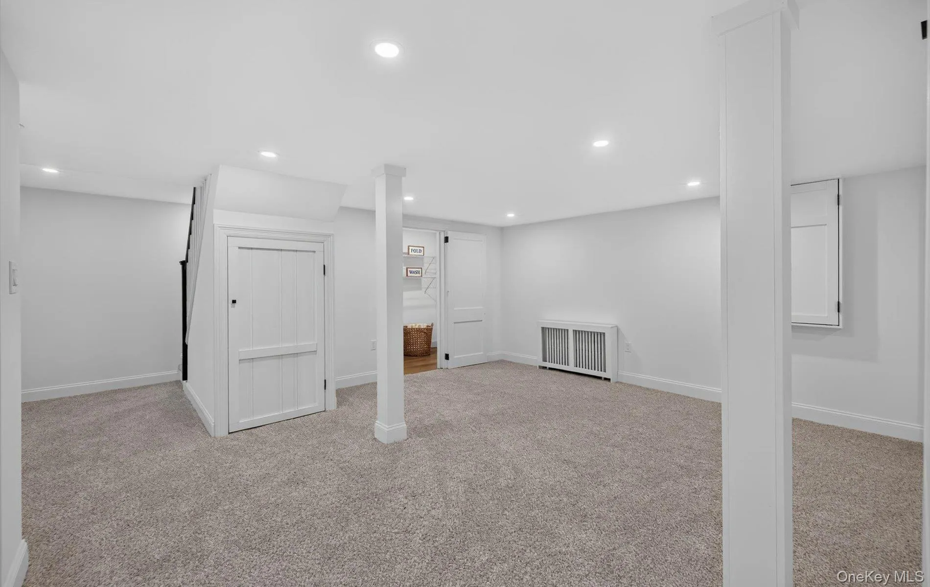 Carpeted room featuring recessed lighting, white walls, and white trim Carpeted room featuring recessed lighting, white walls, and white trim