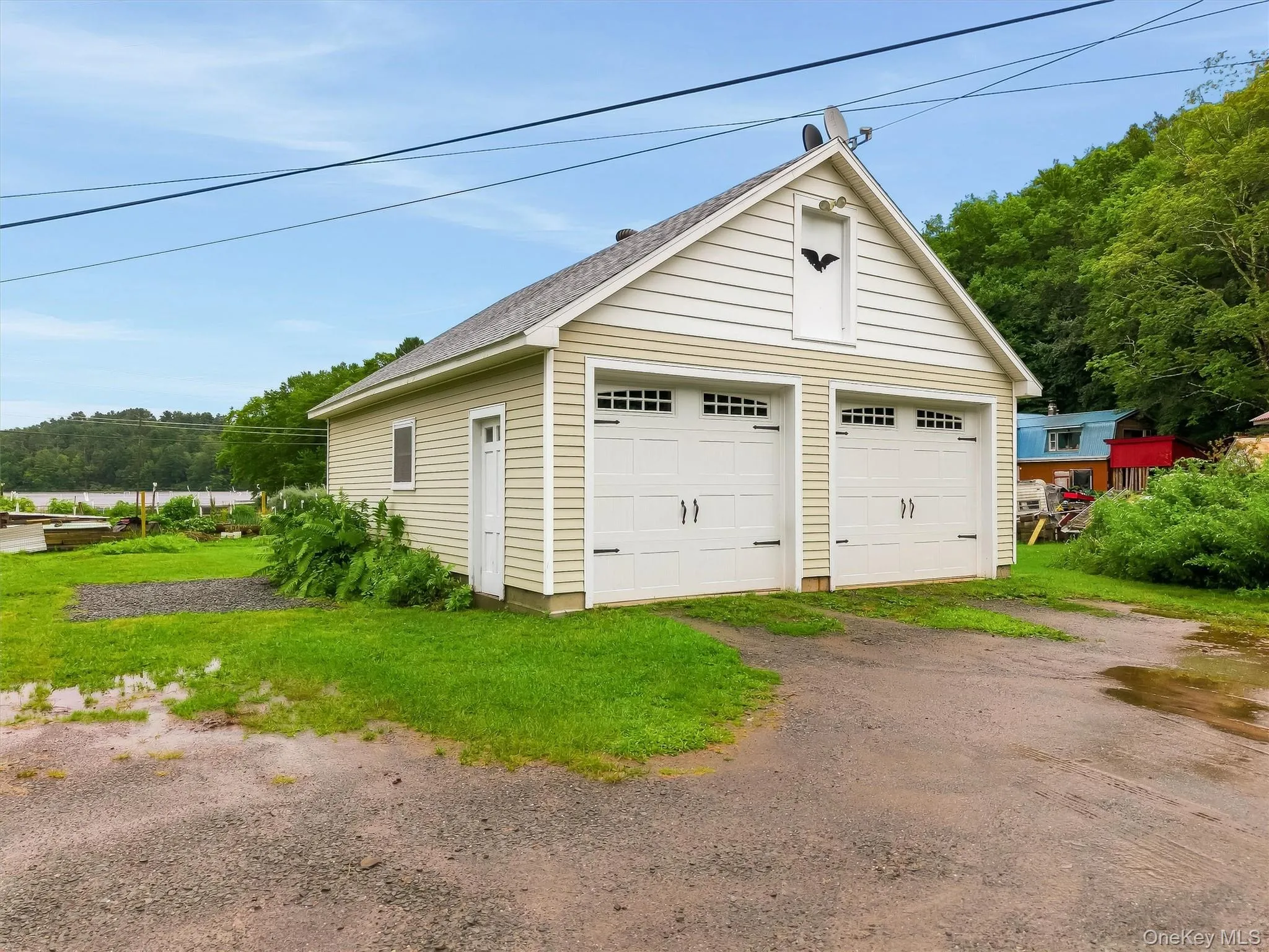 Detached garage with overhead storage and electric Detached garage with overhead storage and electric