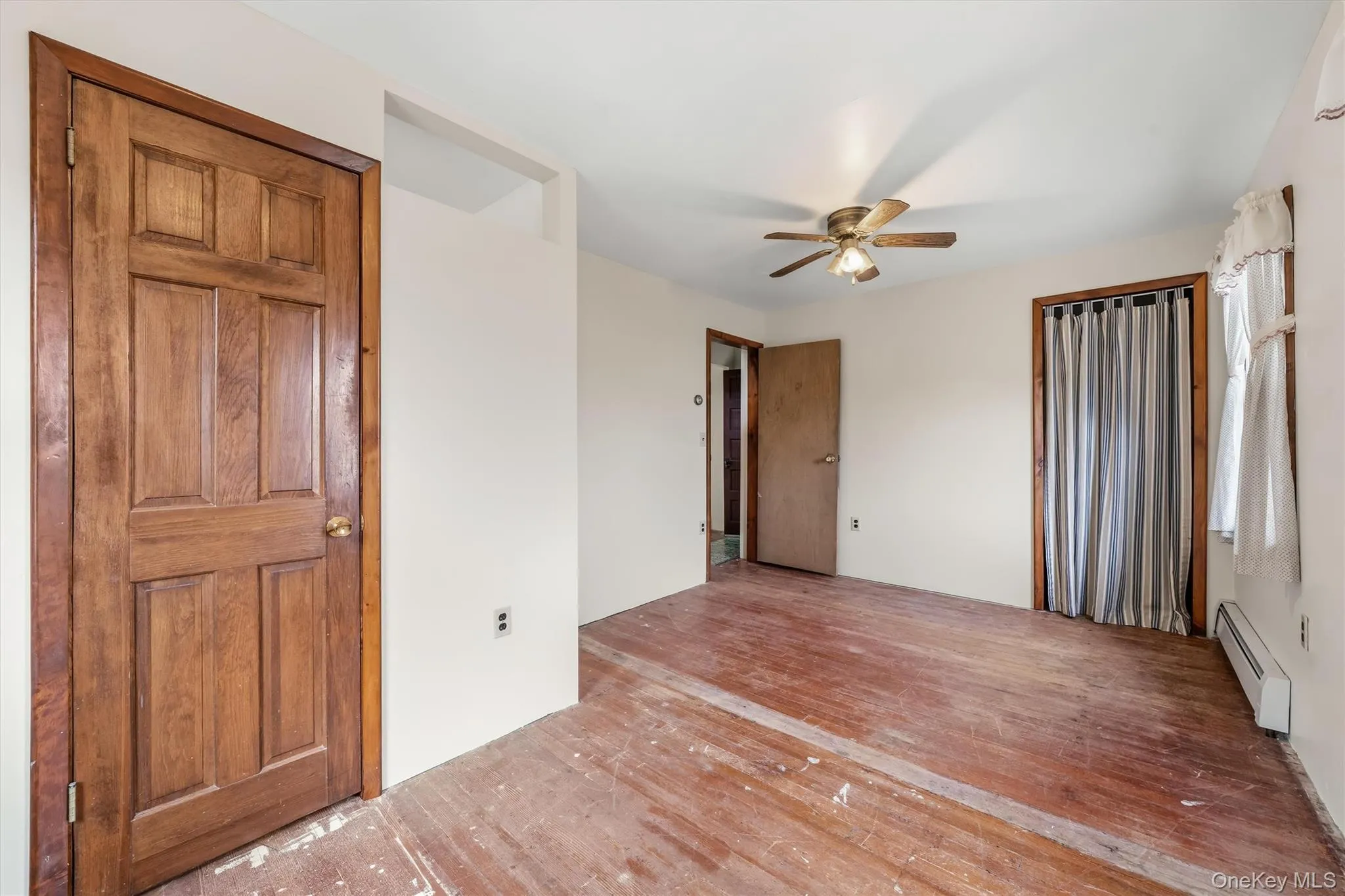 Bedroom 2 with a large walk-in closet & an second closet Bedroom 2 with a large walk-in closet & an second closet