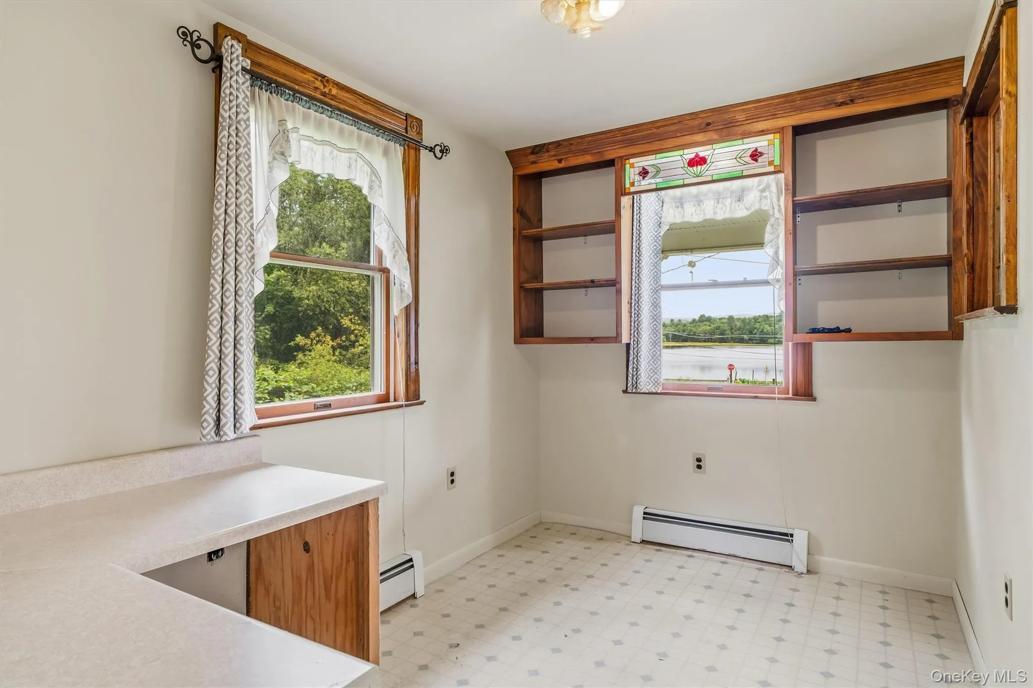 Room off of the kitchen previously used as a sewing room but can be used for an office, breakfast nook, pantry or more! Room off of the kitchen previously used as a sewing room but can be used for an office, breakfast nook, pantry or more!
