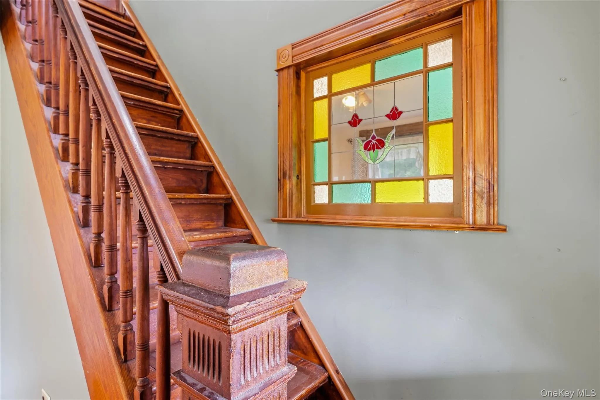 Stairs with beautiful stained glass accent Stairs with beautiful stained glass accent