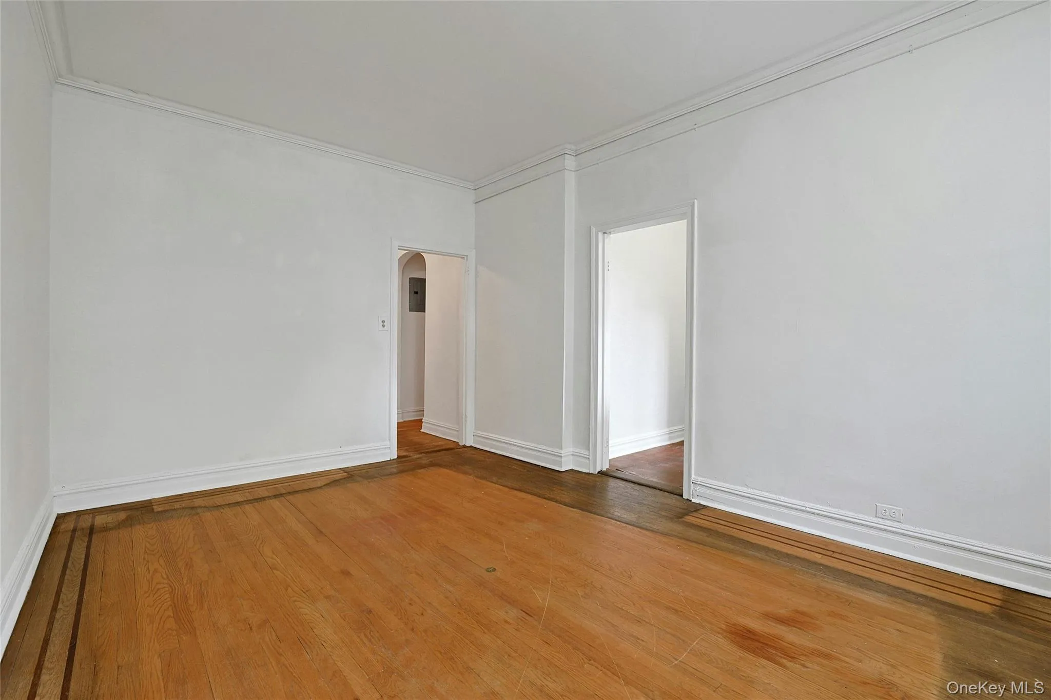 Spacious formal dining room with hardwood floors and an easy flow into the living space. Spacious formal dining room with hardwood floors and an easy flow into the living space.