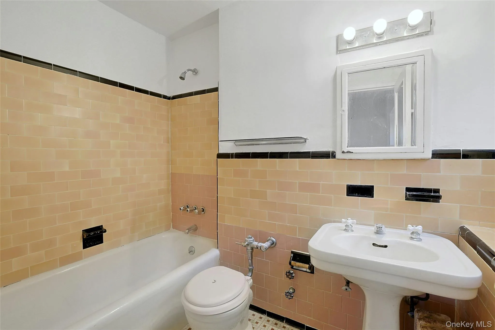 Second full bathroom featuring a tub and shower combination. Second full bathroom featuring a tub and shower combination.