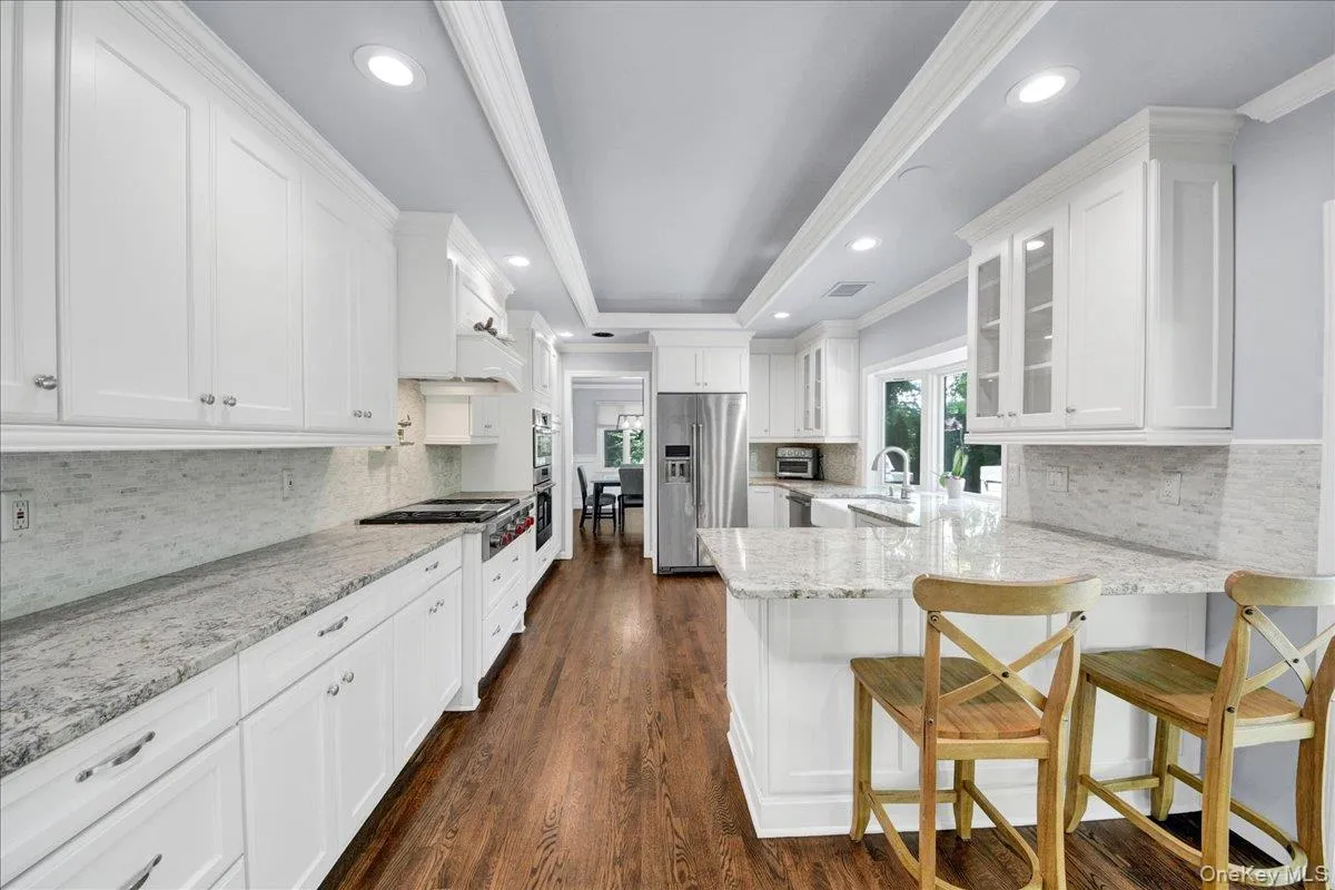 Eat-in Kitchen with granite countertops and stainless steel appliances Eat-in Kitchen with granite countertops and stainless steel appliances