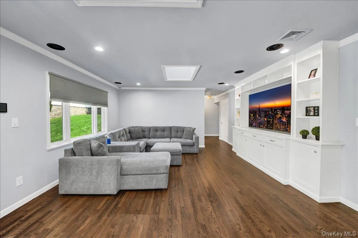 Second living room on main level with built in tv hutch Second living room on main level with built in tv hutch
